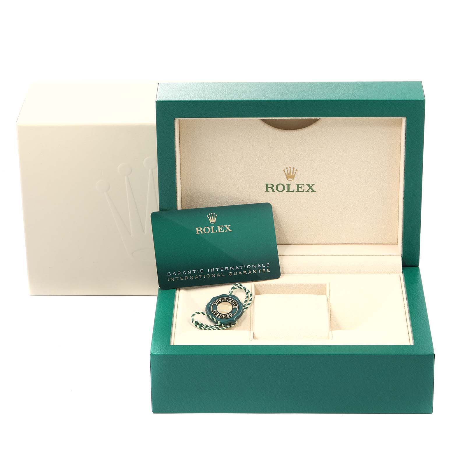 This image shows the box and international guarantee card for a Rolex Oyster Perpetual 124200 Men's Stainless Steel Silver Dial 124200 Men's Stainless Steel Silver Dial watch.