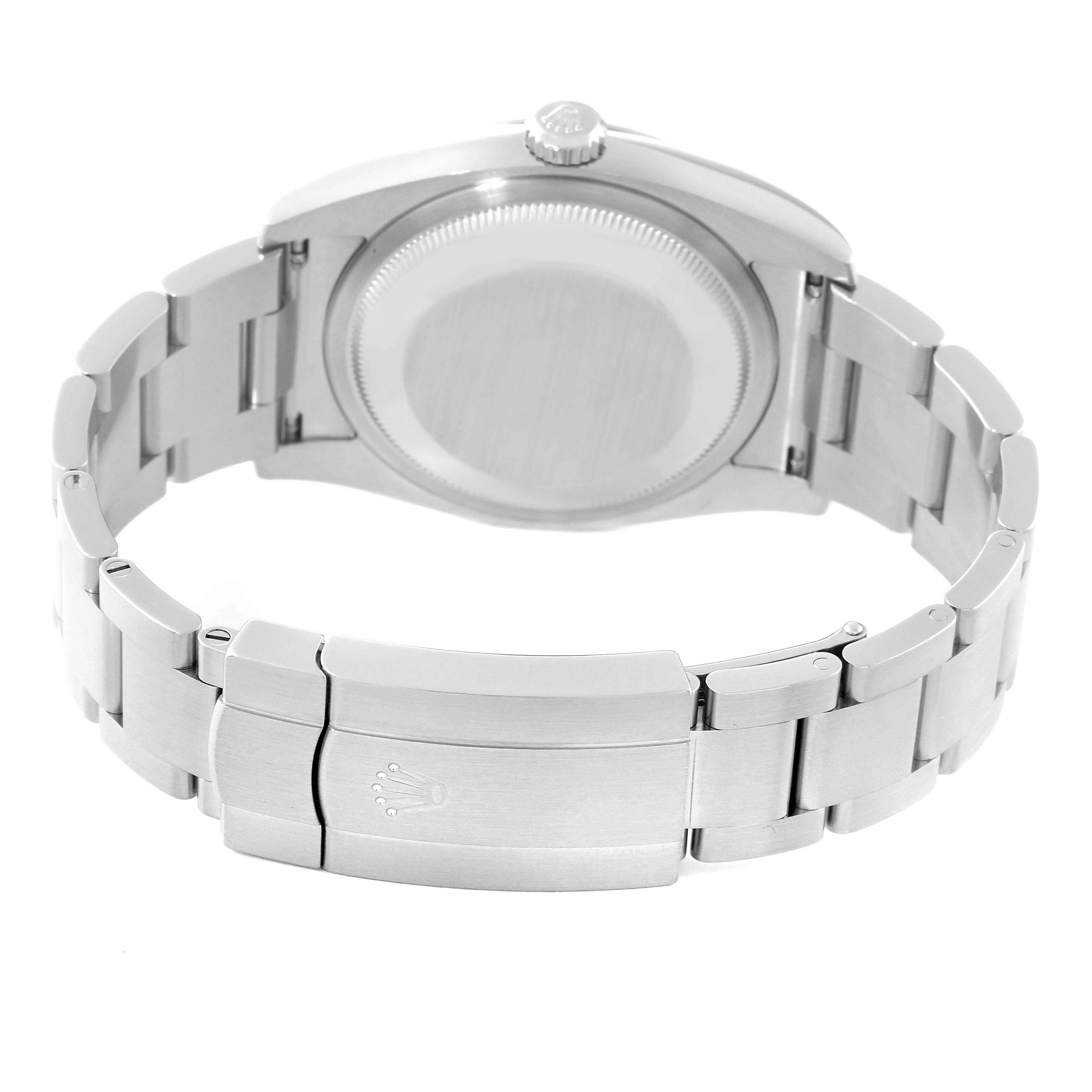 The image shows the back and clasp of a Rolex Oyster Perpetual 116000 Men
s Stainless Steel Blue Dial 116000 Men
s Stainless Steel Blue Dial watch, highlighting its metal bracelet and case back.