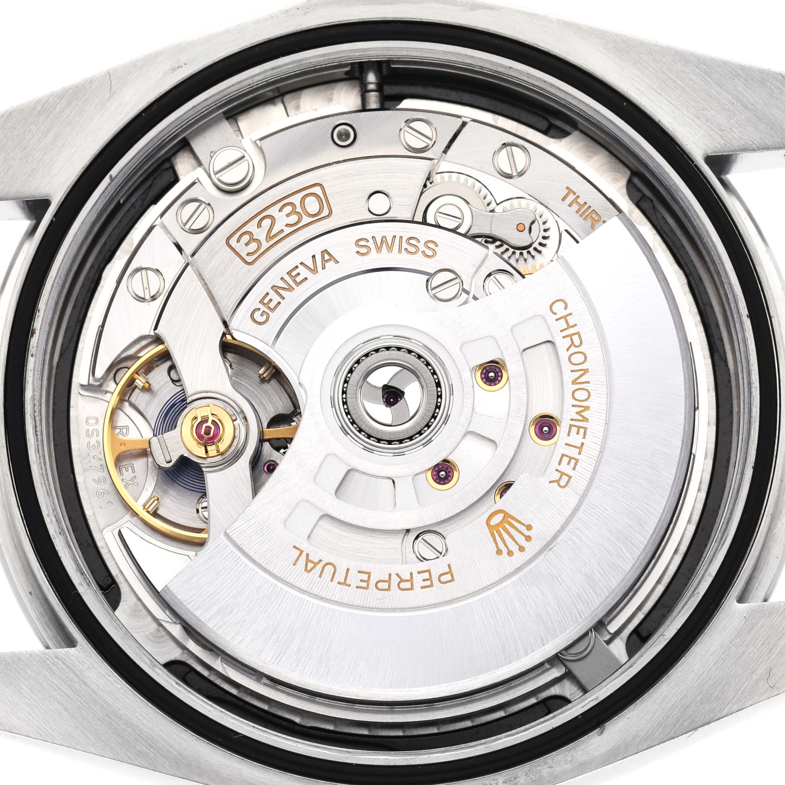 The image shows the Rolex Oyster Perpetual 124300 Men
s Stainless Steel Black Dial 124300 Men
s Stainless Steel Black Dial
s movement from a back angle, highlighting its intricate inner mechanism.