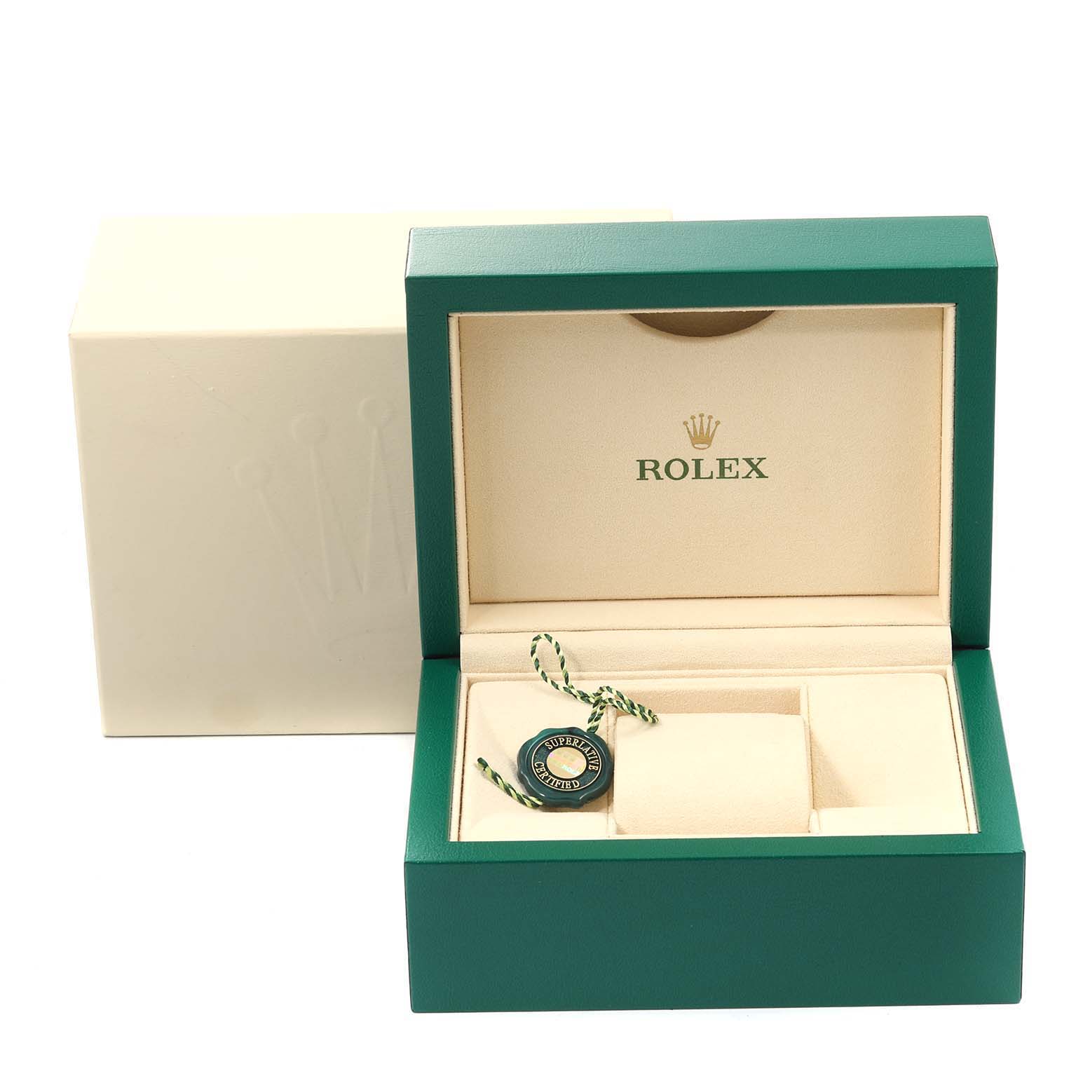 The image shows an open Rolex Mid-Size 177200 Women
s Stainless Steel Blue Dial 177200 Women
s Stainless Steel Blue Dial watch box, revealing the empty interior and green Rolex tag inside.