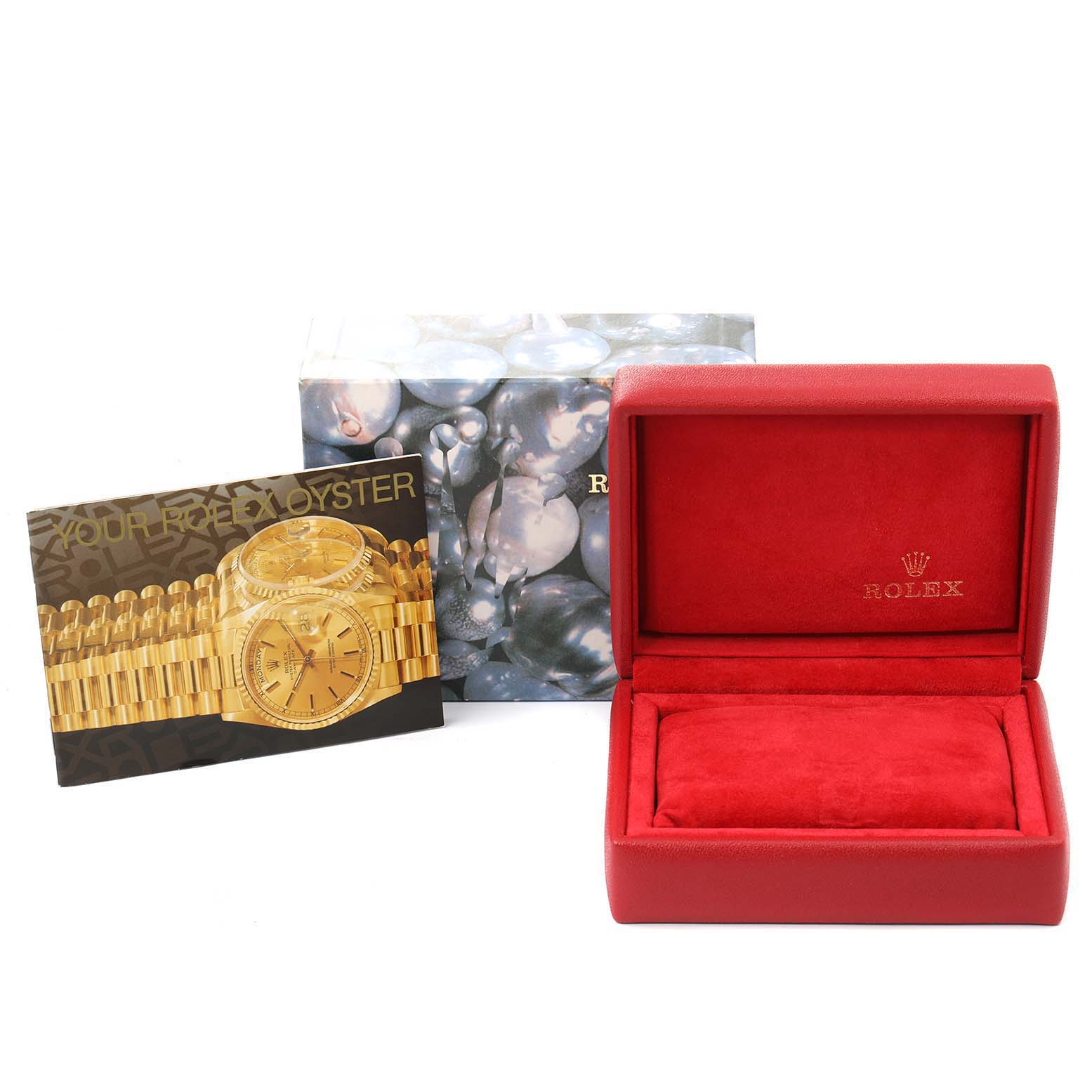 The image shows the packaging, an empty red box, and a brochure for the Rolex Oyster Perpetual 76183 Women's Steel and Gold (two tone) Grey Dial 76183 Women's Steel and Gold (two tone) Grey Dial model watch.