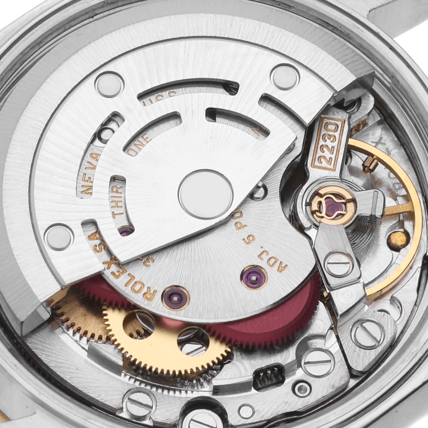This image shows the internal mechanism of a Rolex Oyster Perpetual 76193 Women's Steel and Gold (two tone) White Dial 76193 Women's Steel and Gold (two tone) White Dial watch, focusing on the movement and gears.
