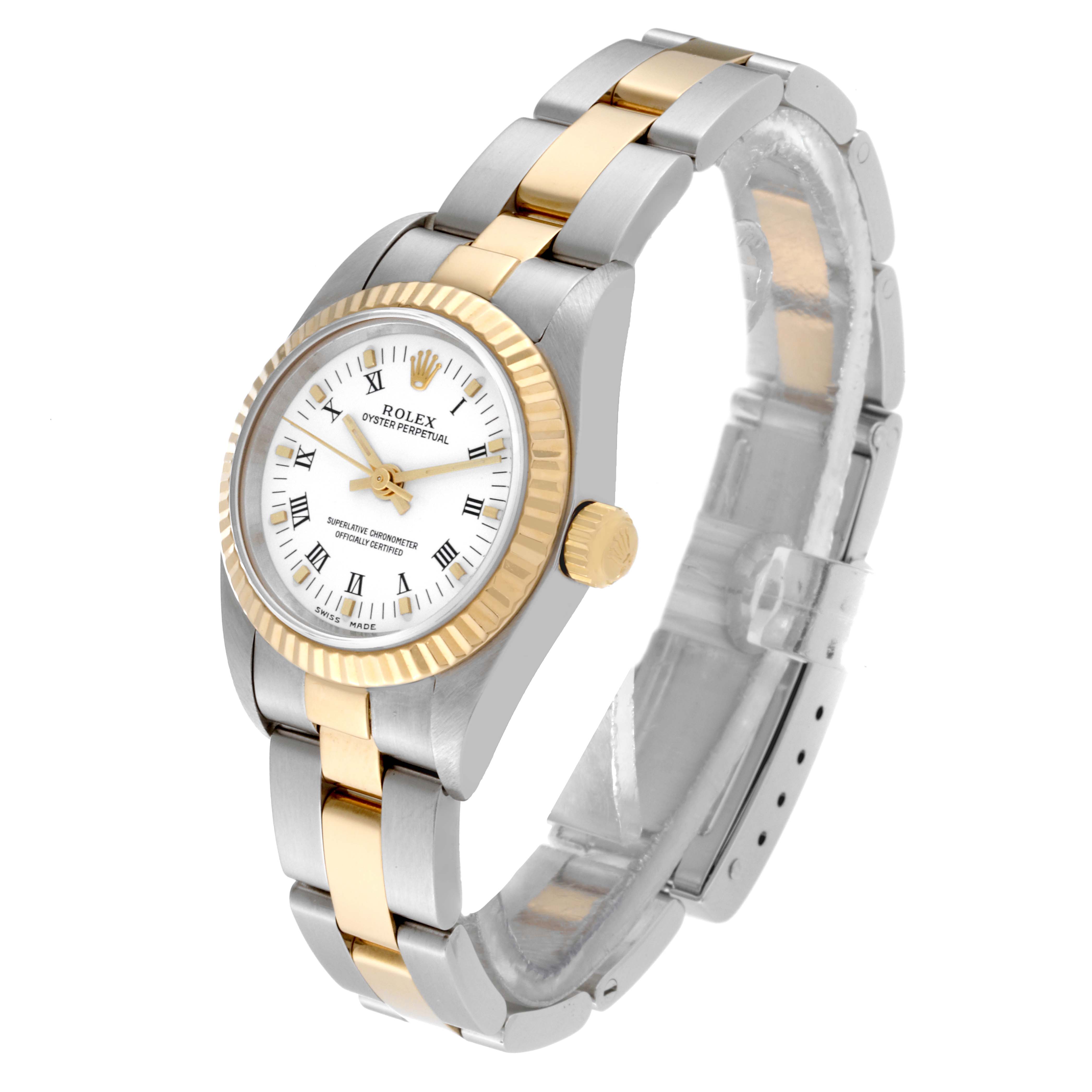 This image shows a Rolex Oyster Perpetual 76193 Women's Steel and Gold (two tone) White Dial 76193 Women's Steel and Gold (two tone) White Dial watch at a slight angle, highlighting the dial, bezel, crown, and two-tone bracelet.
