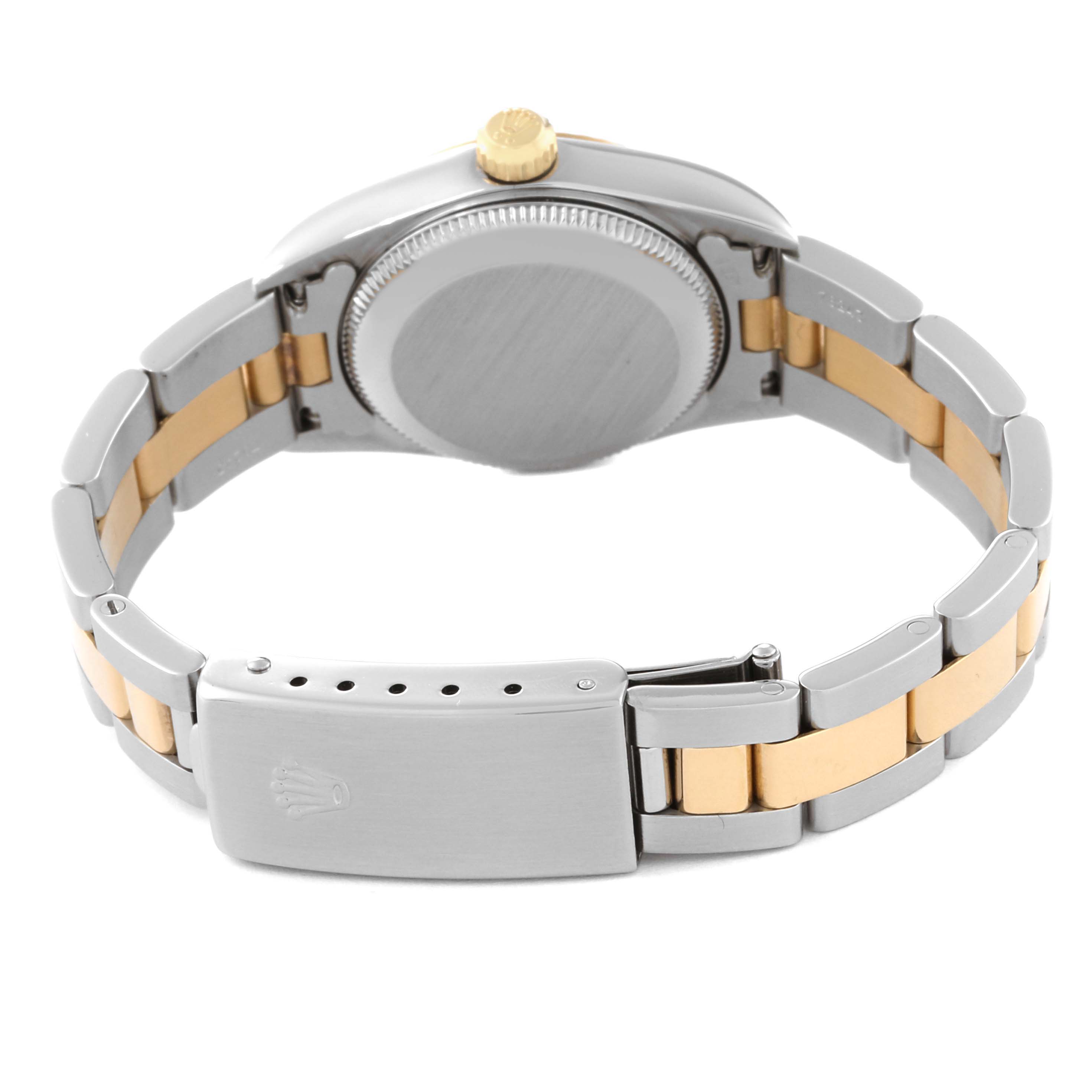 The image shows the back view of a Rolex Oyster Perpetual 76193 Women's Steel and Gold (two tone) White Dial 76193 Women's Steel and Gold (two tone) White Dial watch, highlighting the case, the crown, and the bracelet clasp.