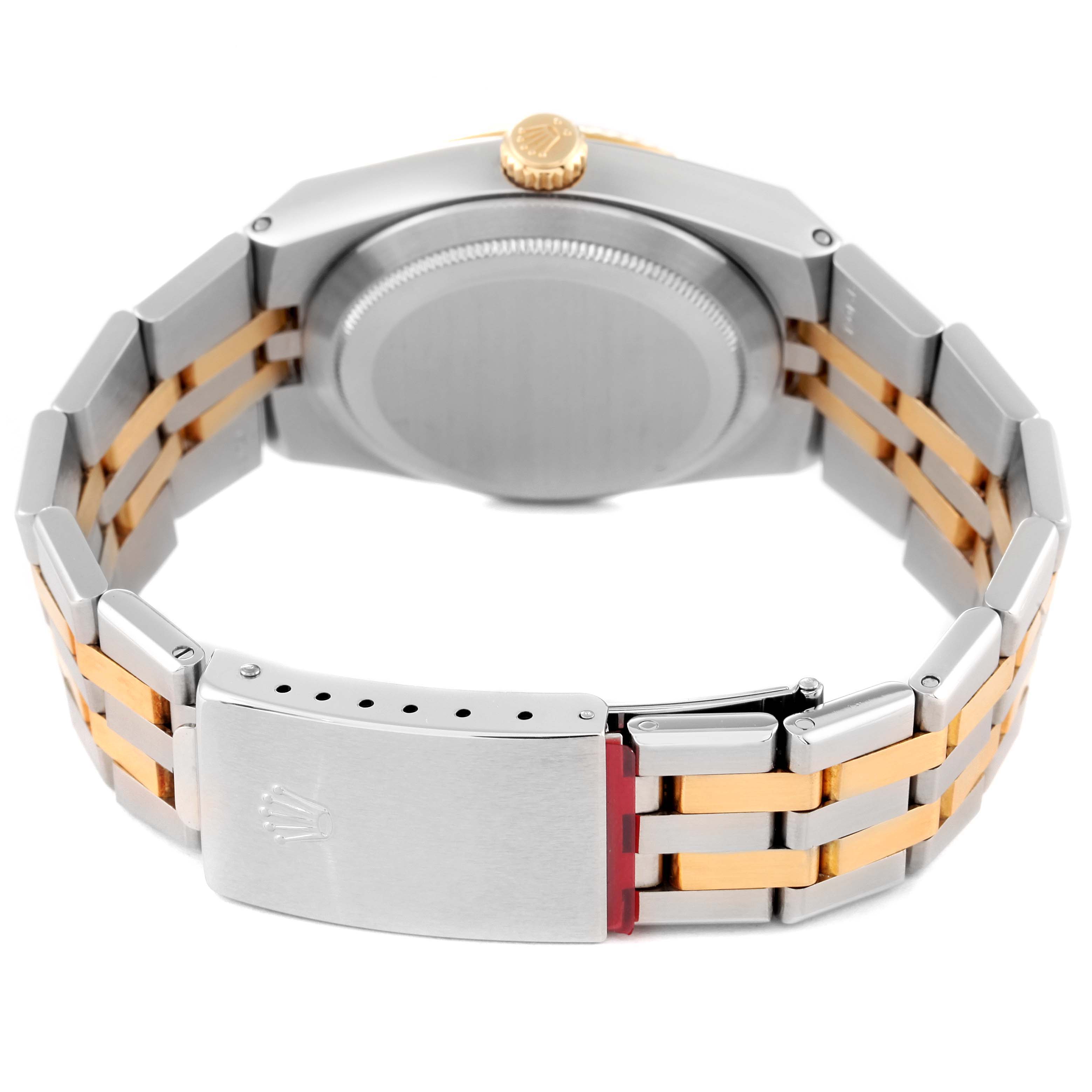 The Rolex Oysterquartz 17013 Men's Steel and Gold (two tone) Champagne Dial 17013 Men's Steel and Gold (two tone) Champagne Dial watch is shown from the back, displaying its case, crown, and two-tone bracelet with the clasp visible.