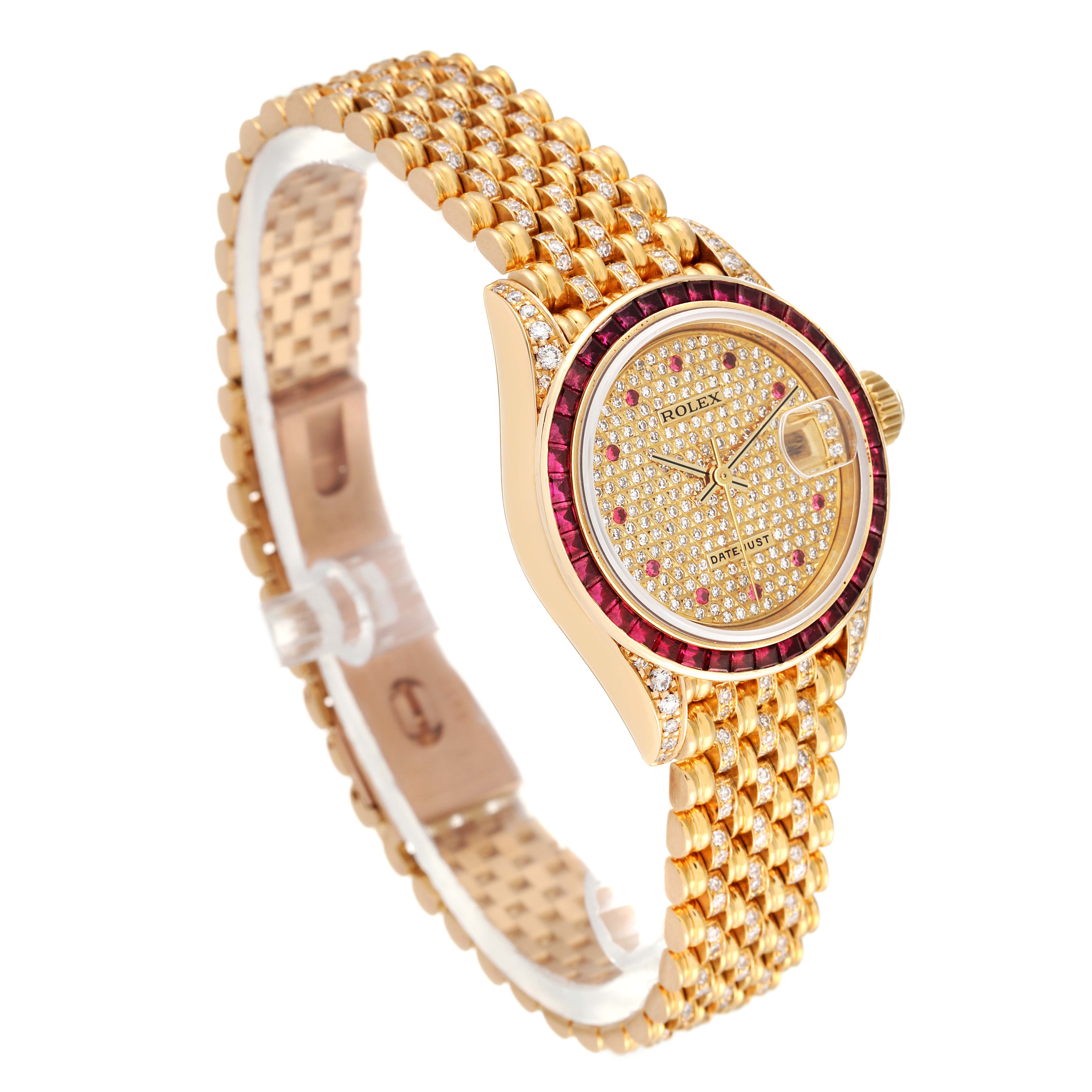 The Rolex President 69198 Women
s Yellow Gold  69198 Women
s Yellow Gold  model watch is shown at a slight angle, highlighting its gold bracelet, jeweled dial, and bezel.