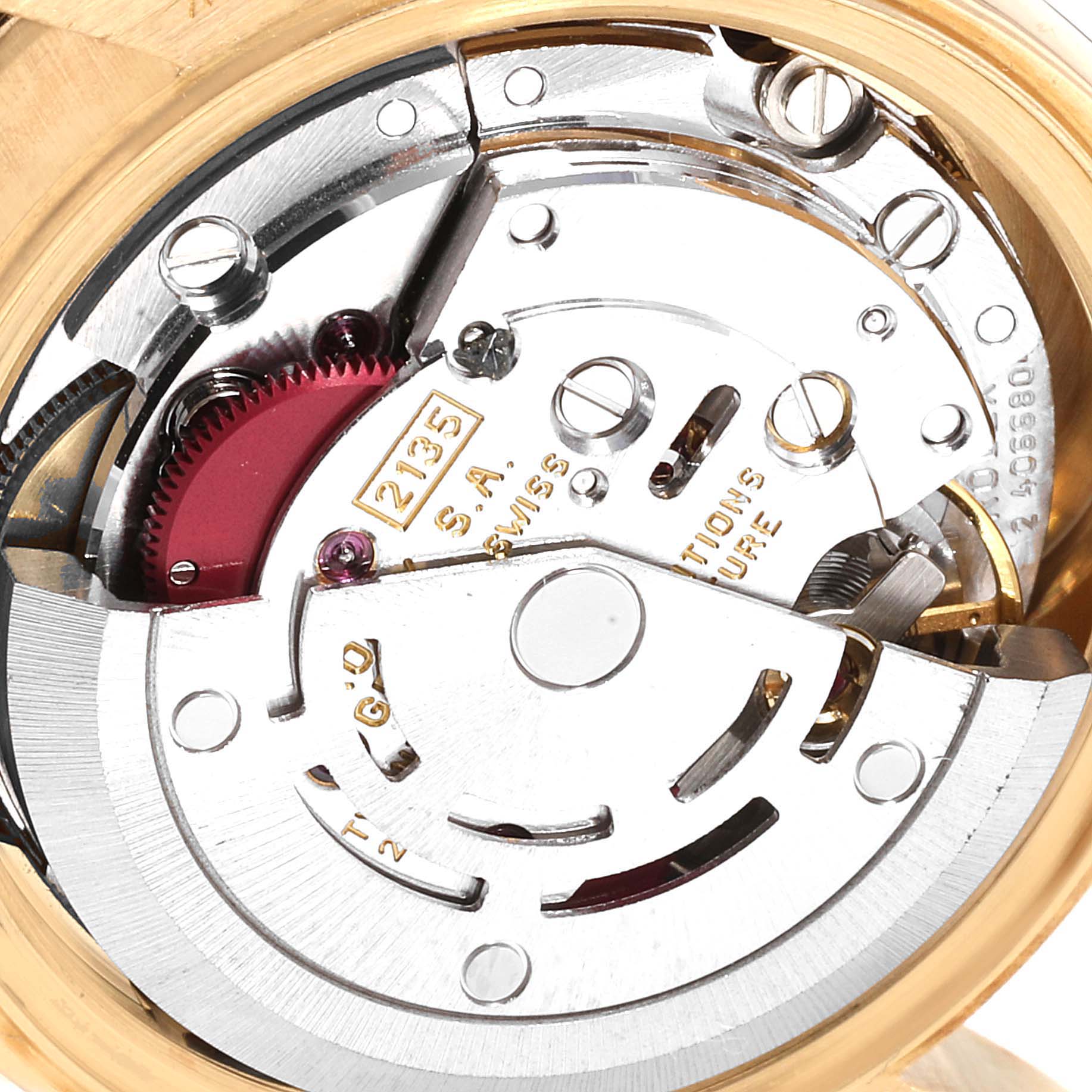 This image shows the intricate internal mechanism of a Rolex President 69238 Women's Yellow Gold Champagne Dial 69238 Women's Yellow Gold Champagne Dial model watch, focusing on its movement components.