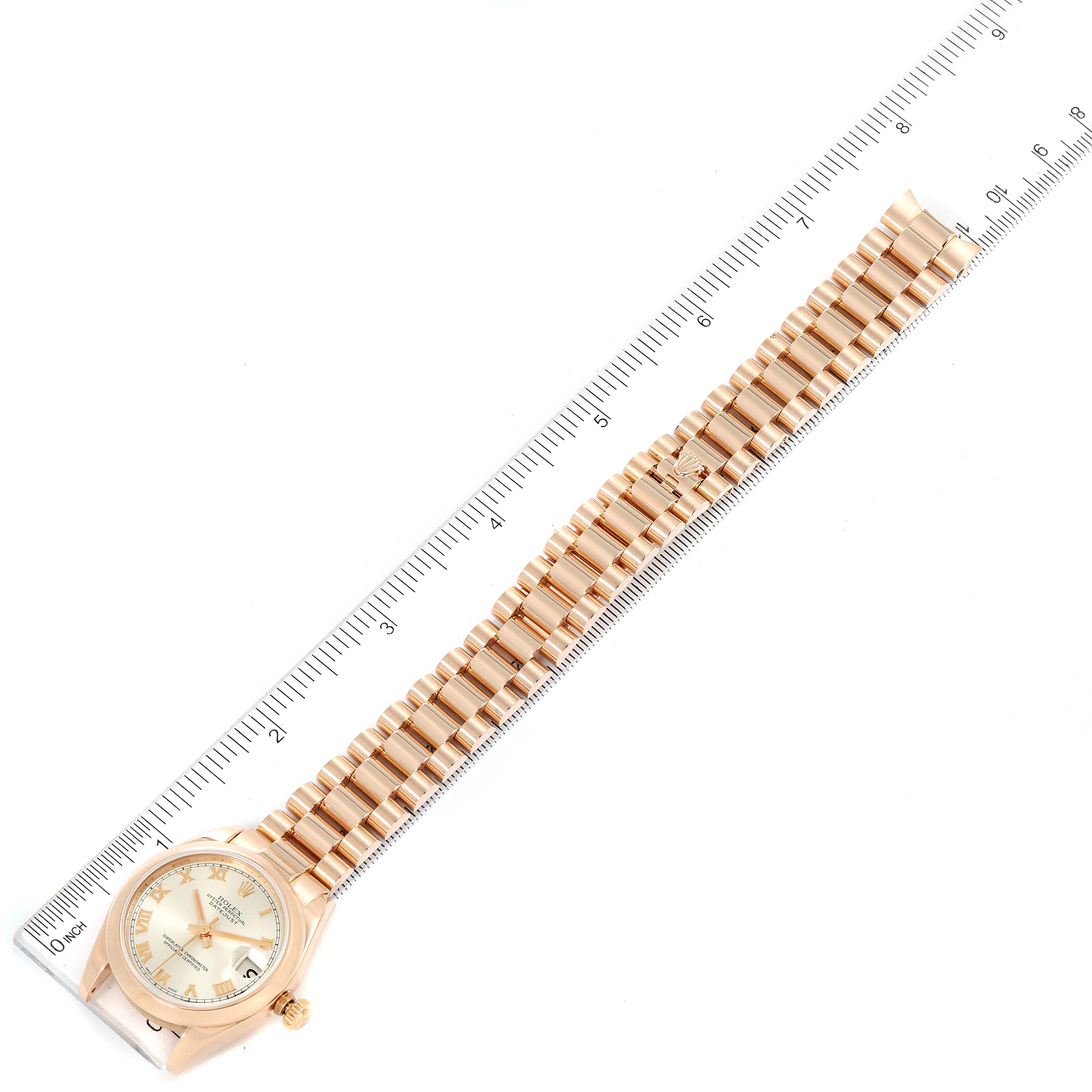 The image shows the full length of a Rolex President 178245 Women's Rose Gold Silver Dial 178245 Women's Rose Gold Silver Dial watch, laid next to a ruler for size reference.