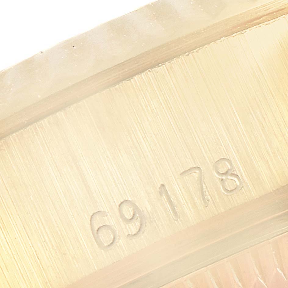 The image shows a close-up of the engraved serial number "69178" on the body of a Rolex President 69178 Women's Yellow Gold Champagne Dial 69178 Women's Yellow Gold Champagne Dial model watch.