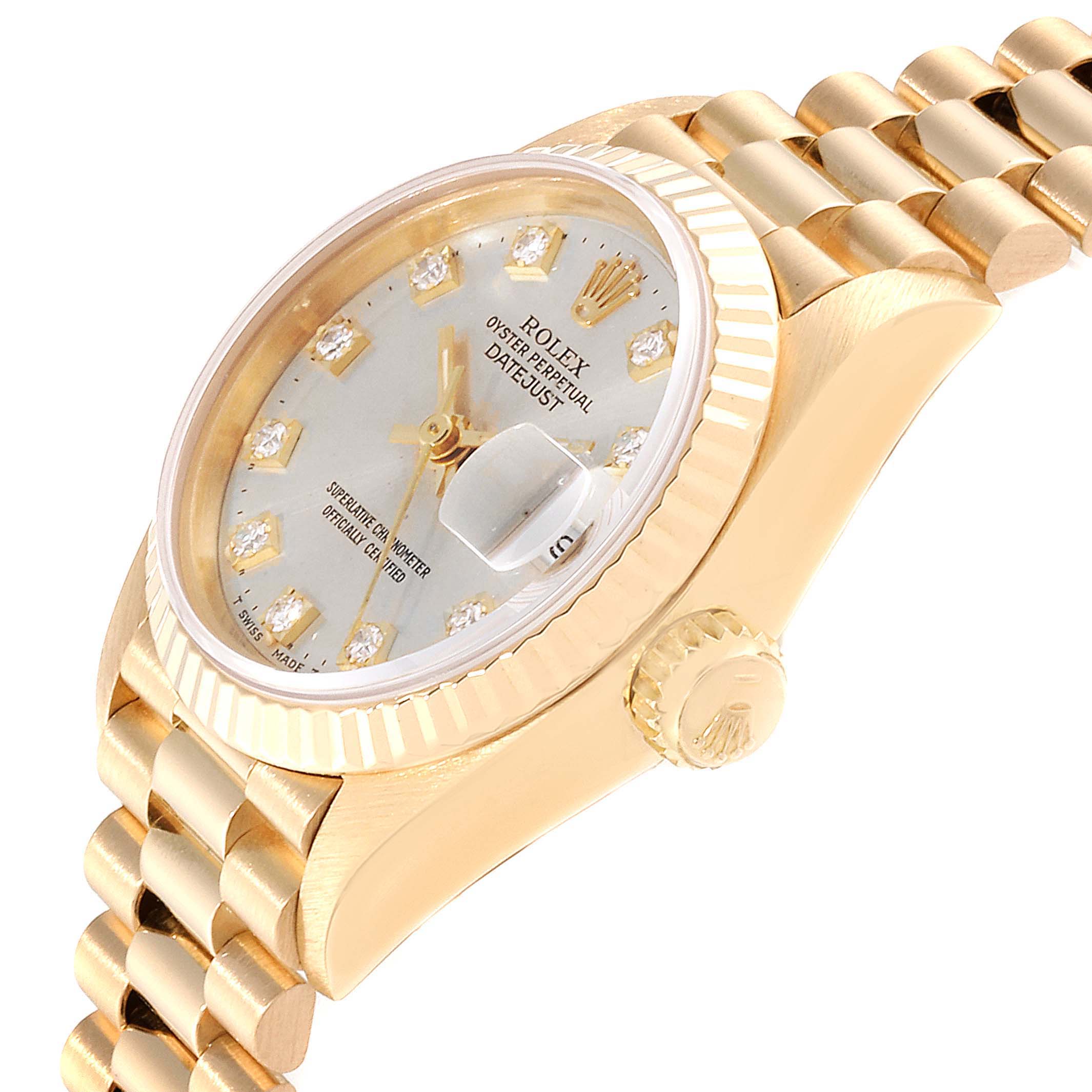 The image shows a side and top angle of a Rolex President 69178 Women's Yellow Gold Silver Dial 69178 Women's Yellow Gold Silver Dial model watch, highlighting the crown, dial, and part of the bracelet.