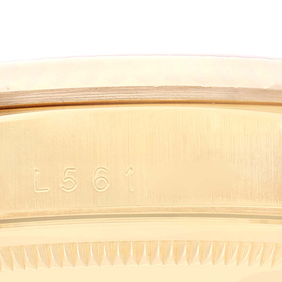 This close-up image shows the side of the case and engraving of the Rolex President 18238 Men
s Yellow Gold Champagne Dial 18238 Men
s Yellow Gold Champagne Dial model watch.