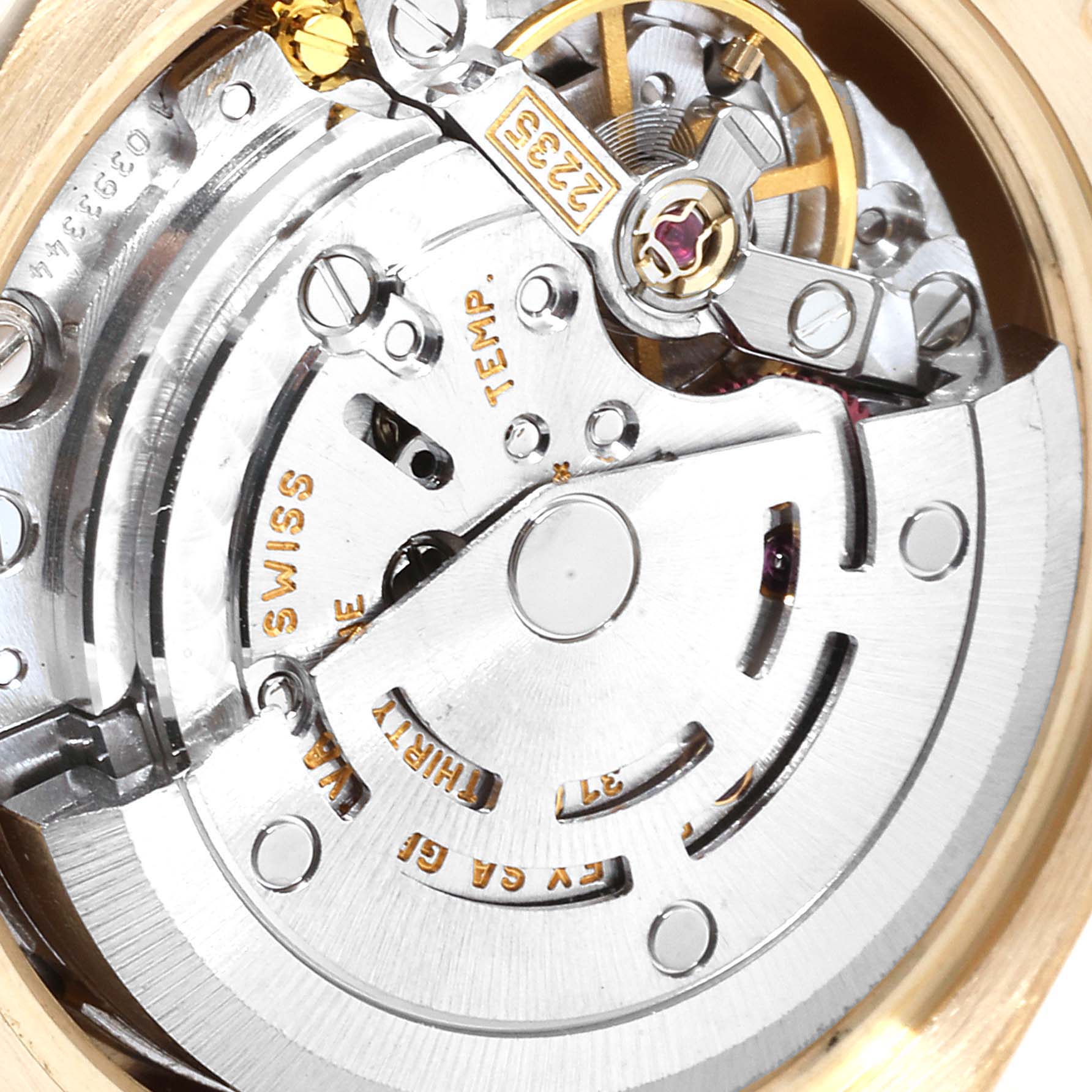 This image shows a close-up view of the movement and internal mechanics of a Rolex President 179138 Women
s Yellow Gold White Dial 179138 Women
s Yellow Gold White Dial model watch.