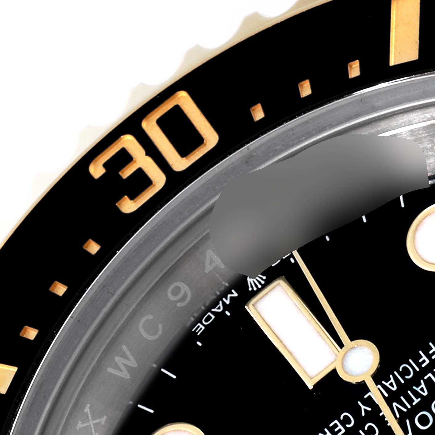 This close-up shows part of the bezel and dial of the Rolex Sea-Dweller 126603 Men's Steel and Gold (two tone) Black Dial 126603 Men's Steel and Gold (two tone) Black Dial watch, emphasizing the "30" mark.
