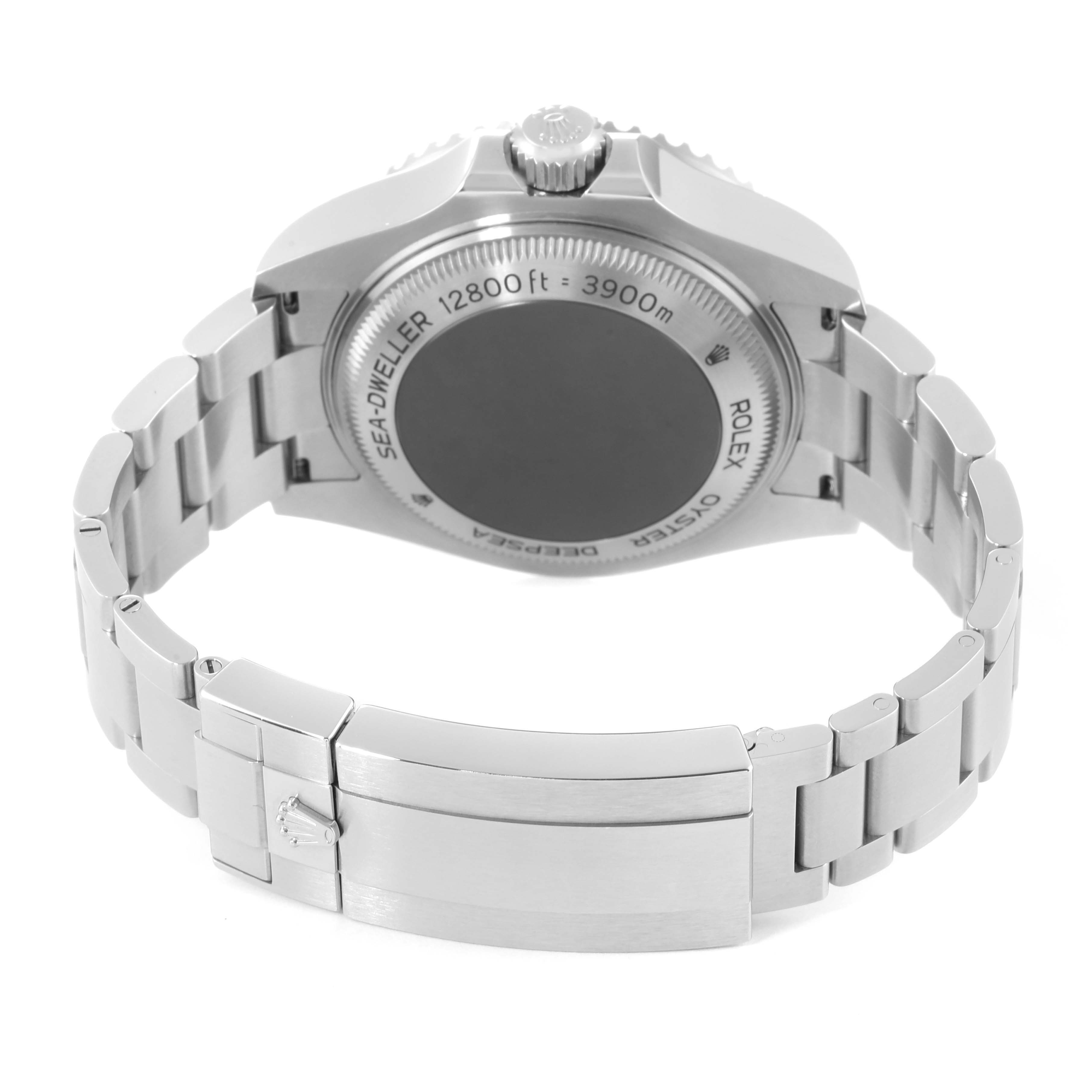 The image shows the back view of a Rolex Sea-Dweller 126660 Men
s Stainless Steel Blue Dial 126660 Men
s Stainless Steel Blue Dial watch, highlighting its case back, bracelet, and clasp.