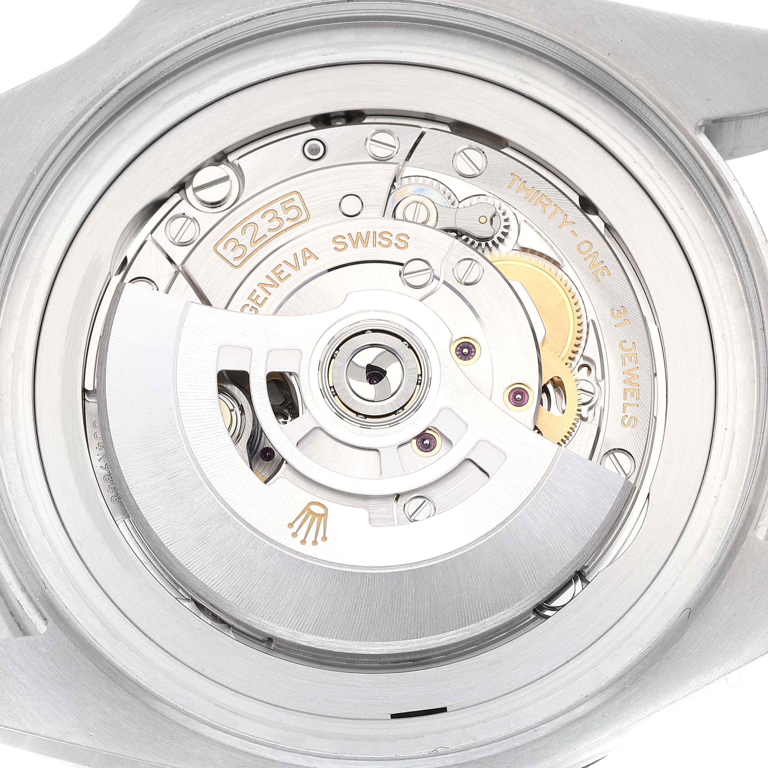 This is a close-up image of the Rolex Sea-Dweller 126660 Men
s Stainless Steel Blue Dial 126660 Men
s Stainless Steel Blue Dial movement, showing intricate internal components, including gears and jewels.