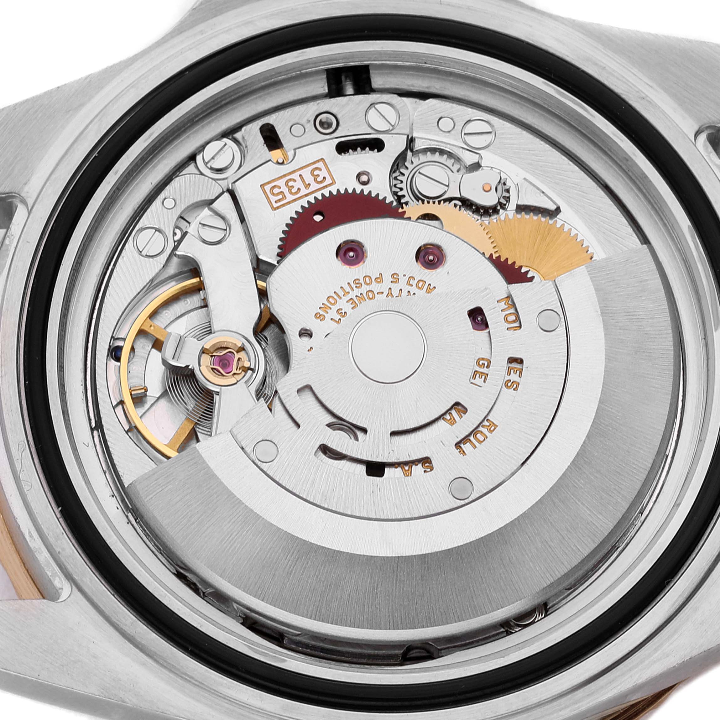 The image shows the internal mechanism of a Rolex Submariner 16613 Men's Steel and Gold (two tone) Blue Dial 16613 Men's Steel and Gold (two tone) Blue Dial watch from a rear angle, focusing on its movement components.
