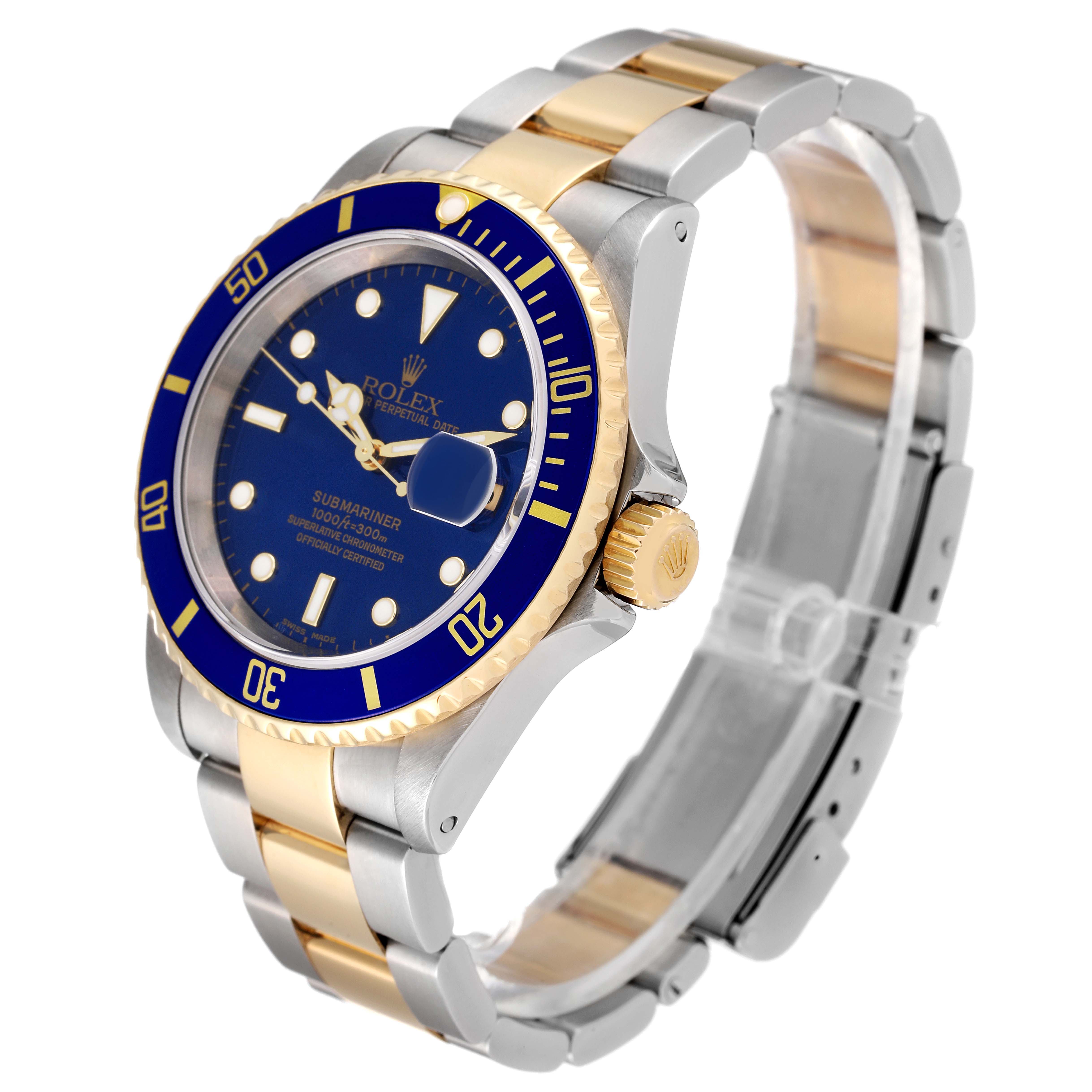 This image shows a Rolex Submariner 16613 Men's Steel and Gold (two tone) Blue Dial 16613 Men's Steel and Gold (two tone) Blue Dial watch, angled slightly to showcase the face, bezel, crown, and band.
