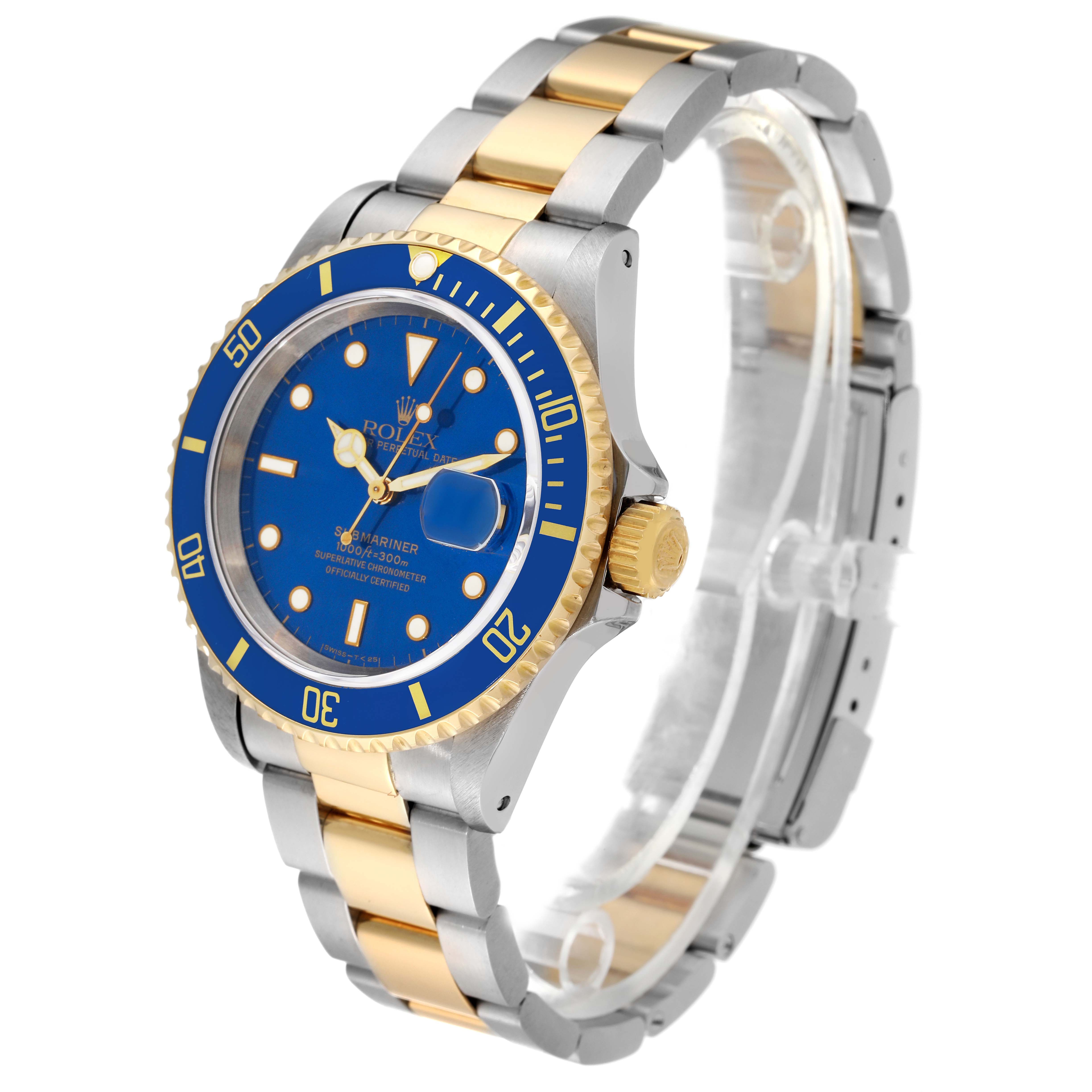 The image shows a Rolex Submariner 16613 Men's Steel and Gold (two tone) Blue Dial 16613 Men's Steel and Gold (two tone) Blue Dial watch at a slight angle, highlighting its blue dial, gold bezel, and two-tone metal bracelet.
