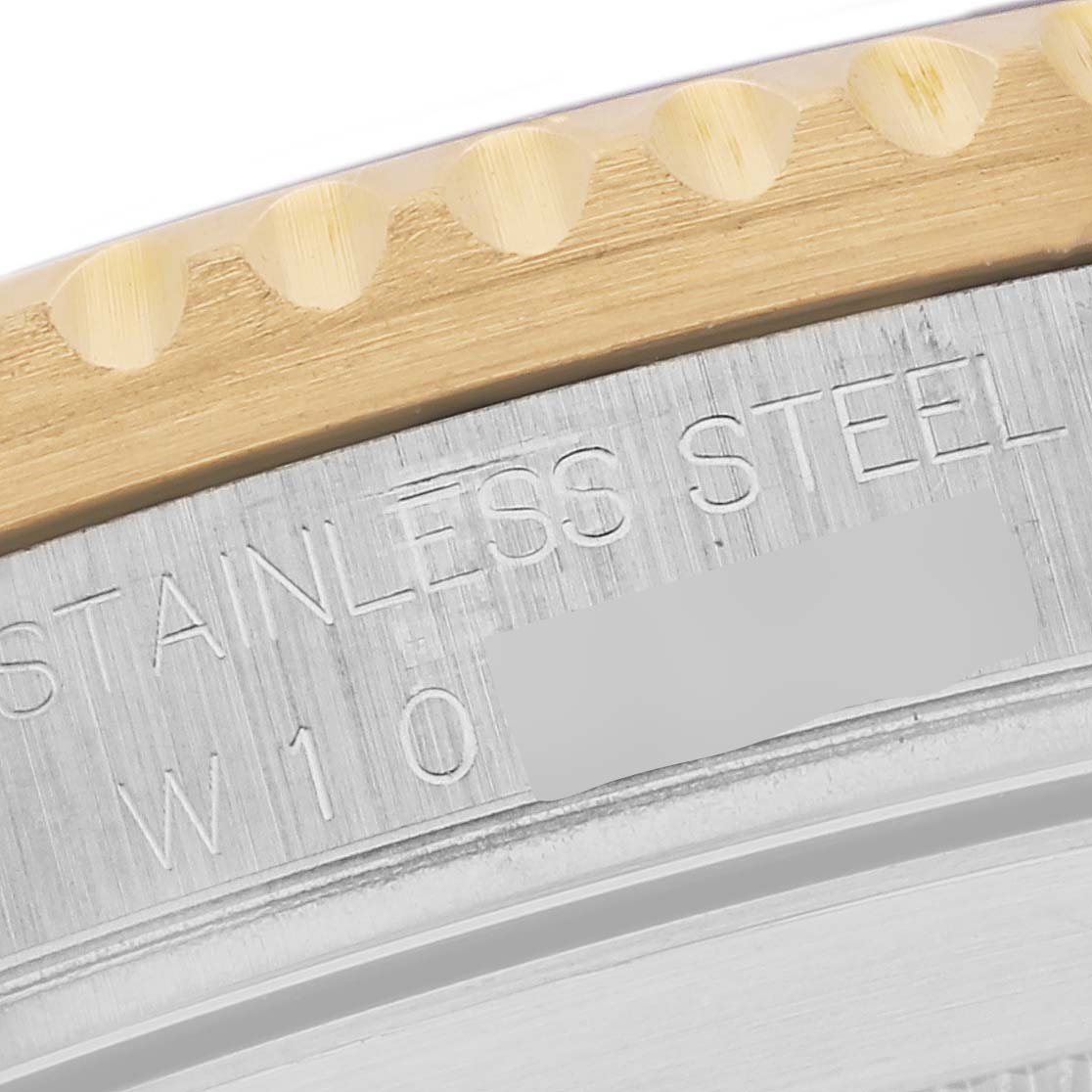 This close-up shows the side view of the watch bezel and serial number engraving of a Rolex Submariner 16613 Men's Steel and Gold (two tone) Blue Dial 16613 Men's Steel and Gold (two tone) Blue Dial.