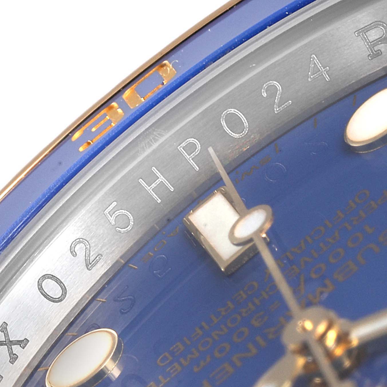 Close-up angle of the Rolex Submariner 116613 Men
s Steel and Gold (two tone) Blue Dial 116613 Men
s Steel and Gold (two tone) Blue Dial watch showing part of the bezel and dial details.