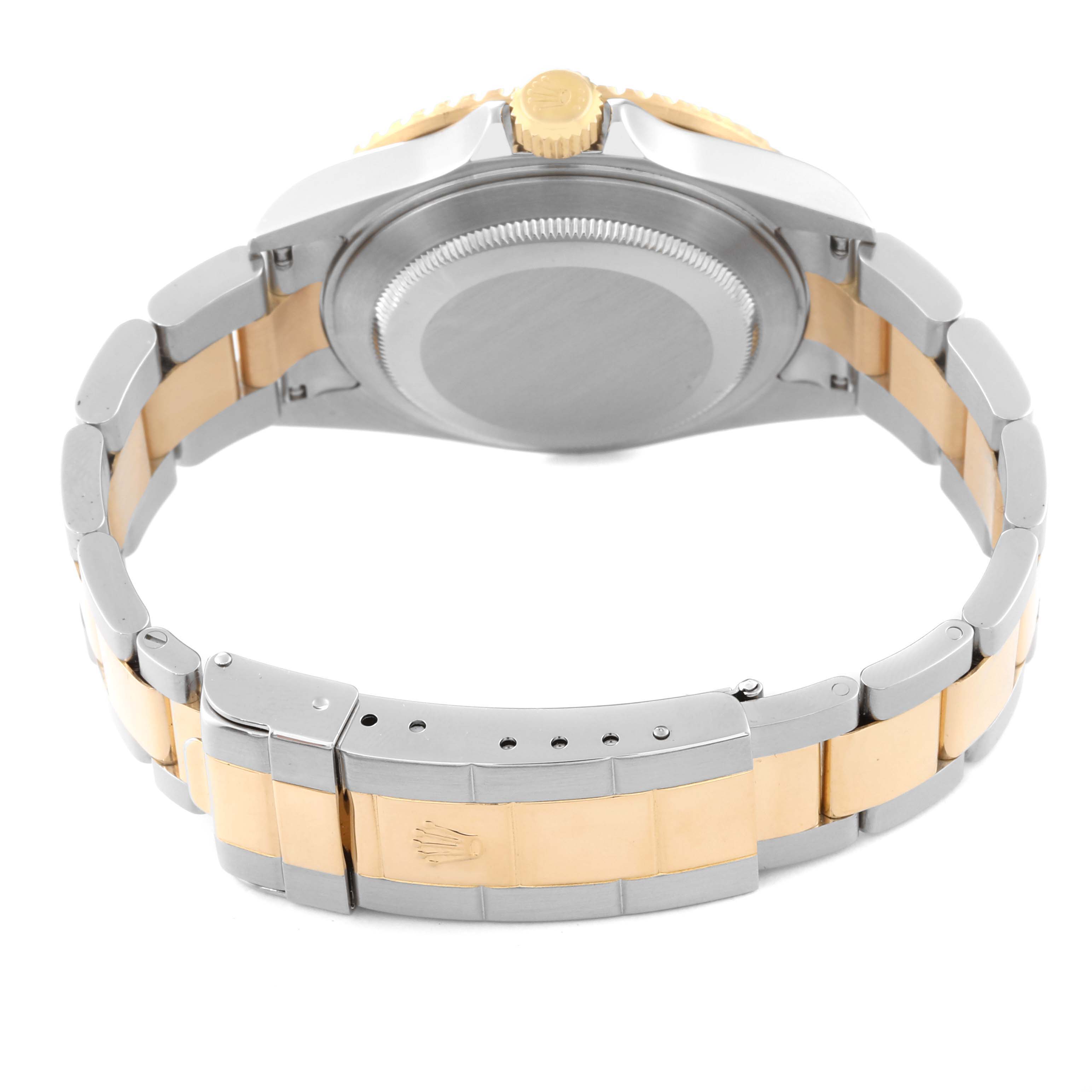 This image shows the back case and bracelet of a Rolex Submariner 16613LN Men's Steel and Gold (two tone) Mother of Pearl Dial 16613LN Men's Steel and Gold (two tone) Mother of Pearl Dial watch, viewed from the rear.