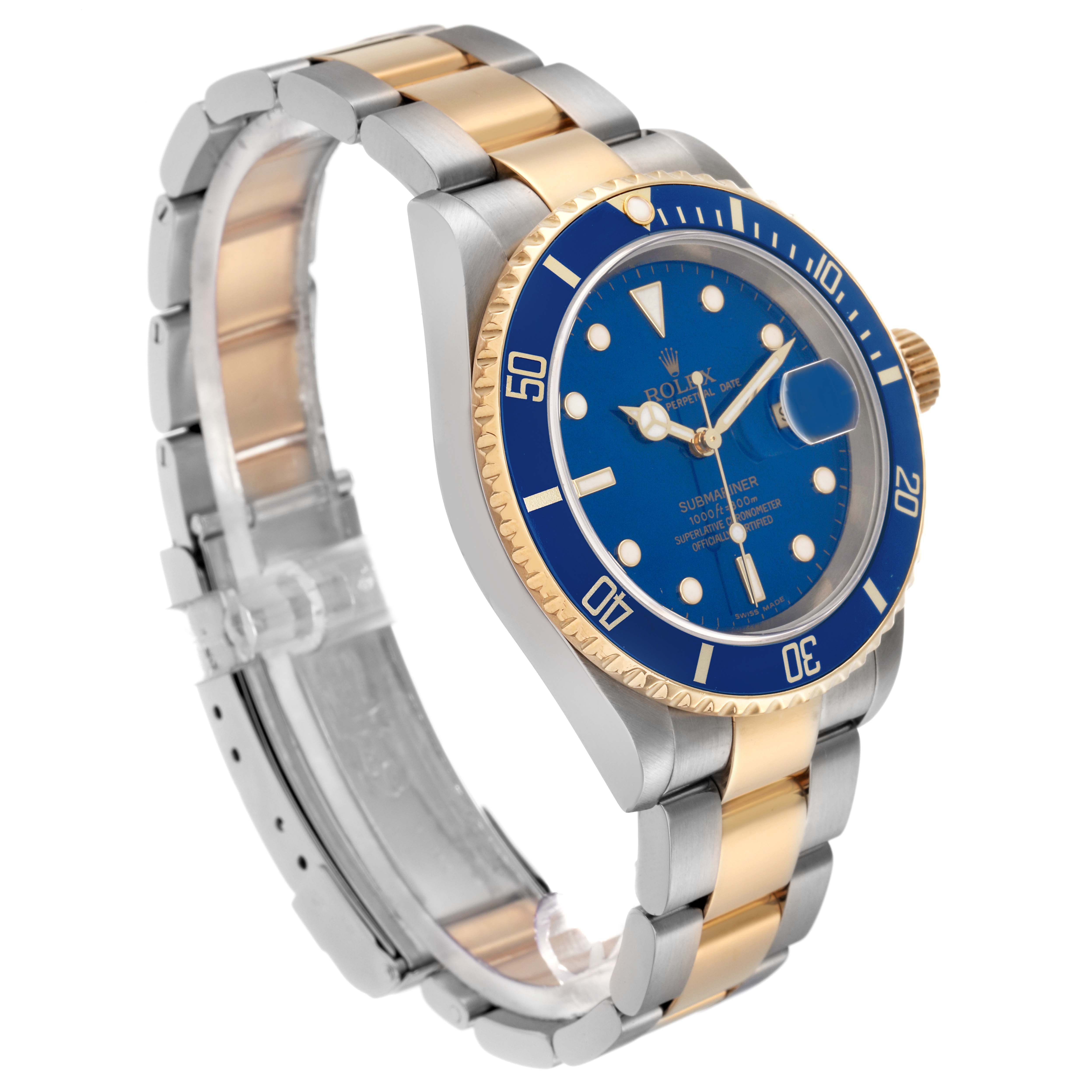 The Rolex Submariner 16613 Men
s Steel and Gold (two tone) Blue Dial 16613 Men
s Steel and Gold (two tone) Blue Dial watch is shown at an angle displaying the face, bezel, side case, and part of the bracelet.