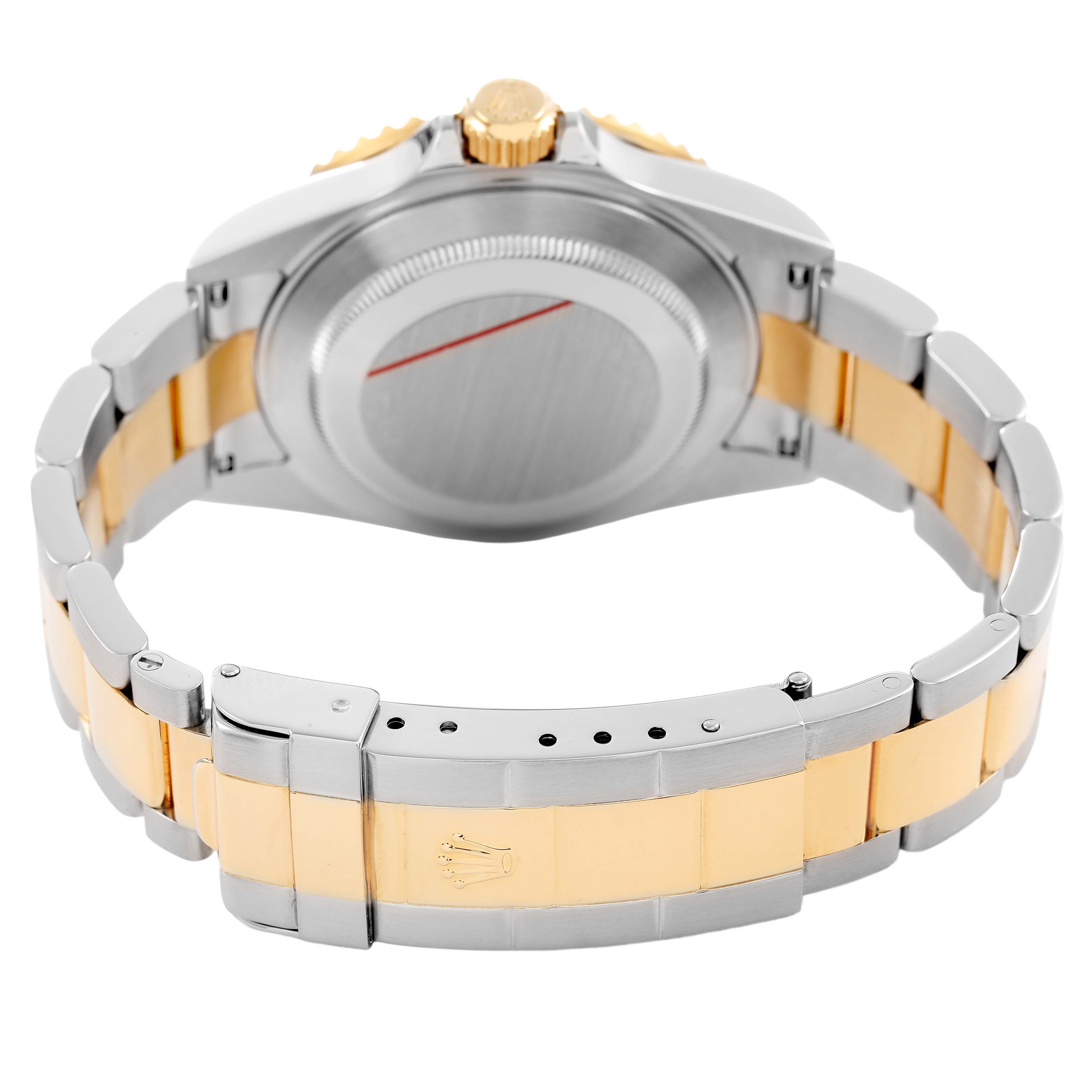 The image shows the back and bracelet of a Rolex Submariner 16613 Men's Steel and Gold (two tone) Blue Dial, highlighting the clasp and two-tone metal.