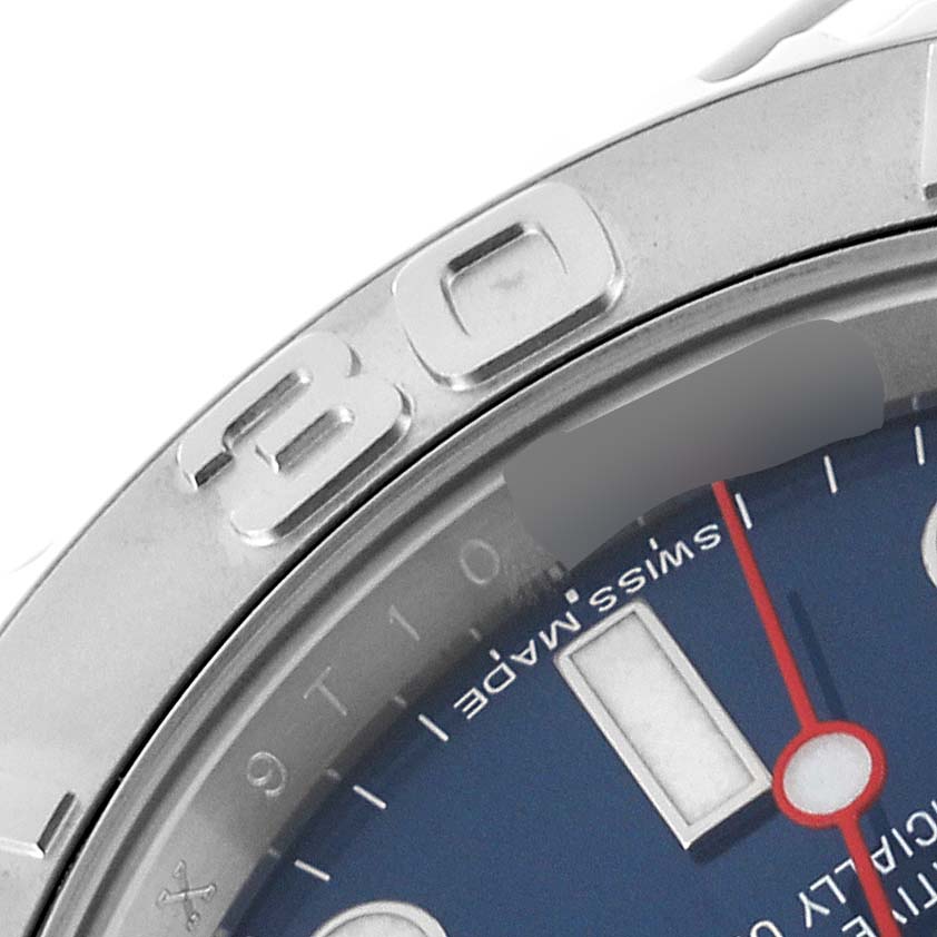 This close-up image shows part of the bezel and the edge of the dial on a Rolex Yacht-Master 116622 Men's Stainless Steel Blue Dial 116622 Men's Stainless Steel Blue Dial watch.