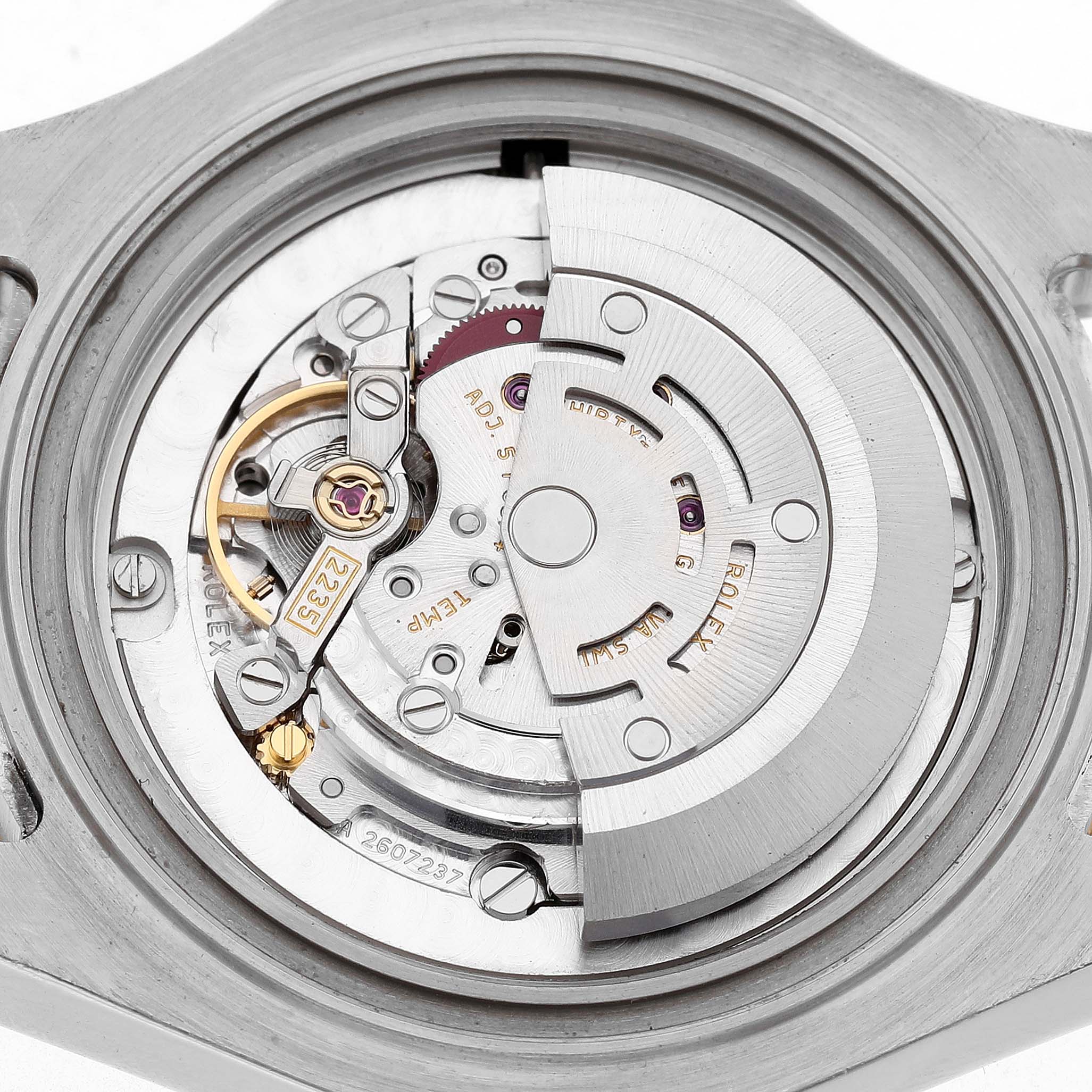 The image shows the case back of the Rolex Yacht-Master 168623 Men's Steel and Gold (two tone) White Dial, revealing its intricate automatic movement mechanics.
