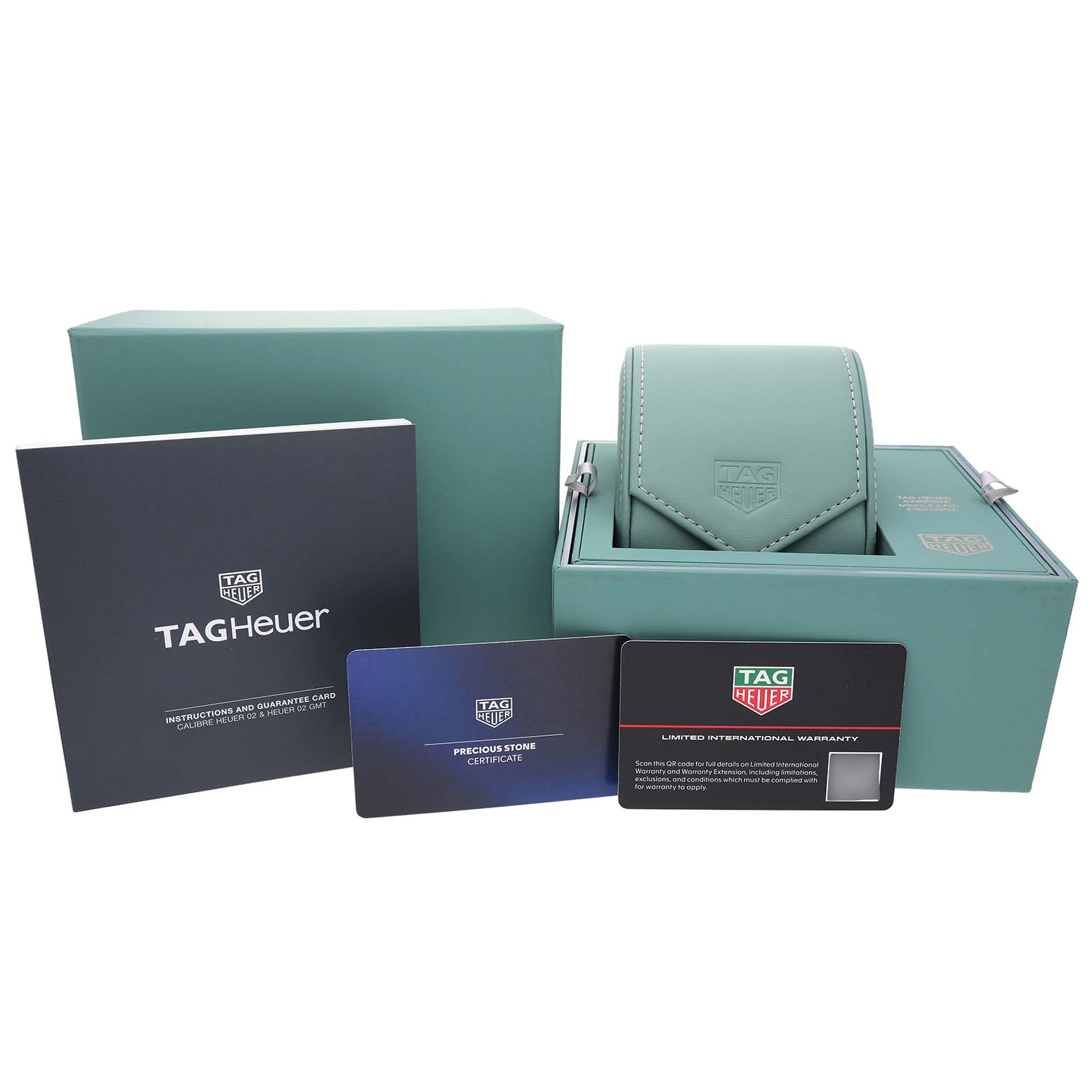 The image shows a Tag Heuer Carrera CBS221A Men's Stainless Steel Green Dial watch box, warranty cards, and instructions.