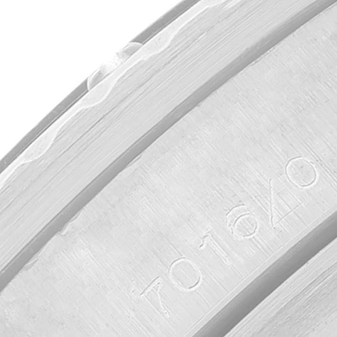 This image shows a close-up of an engraved number on the bezel of a Tudor Submariner 7016 Men
s Stainless Steel Black Dial 7016 Men
s Stainless Steel Black Dial watch.