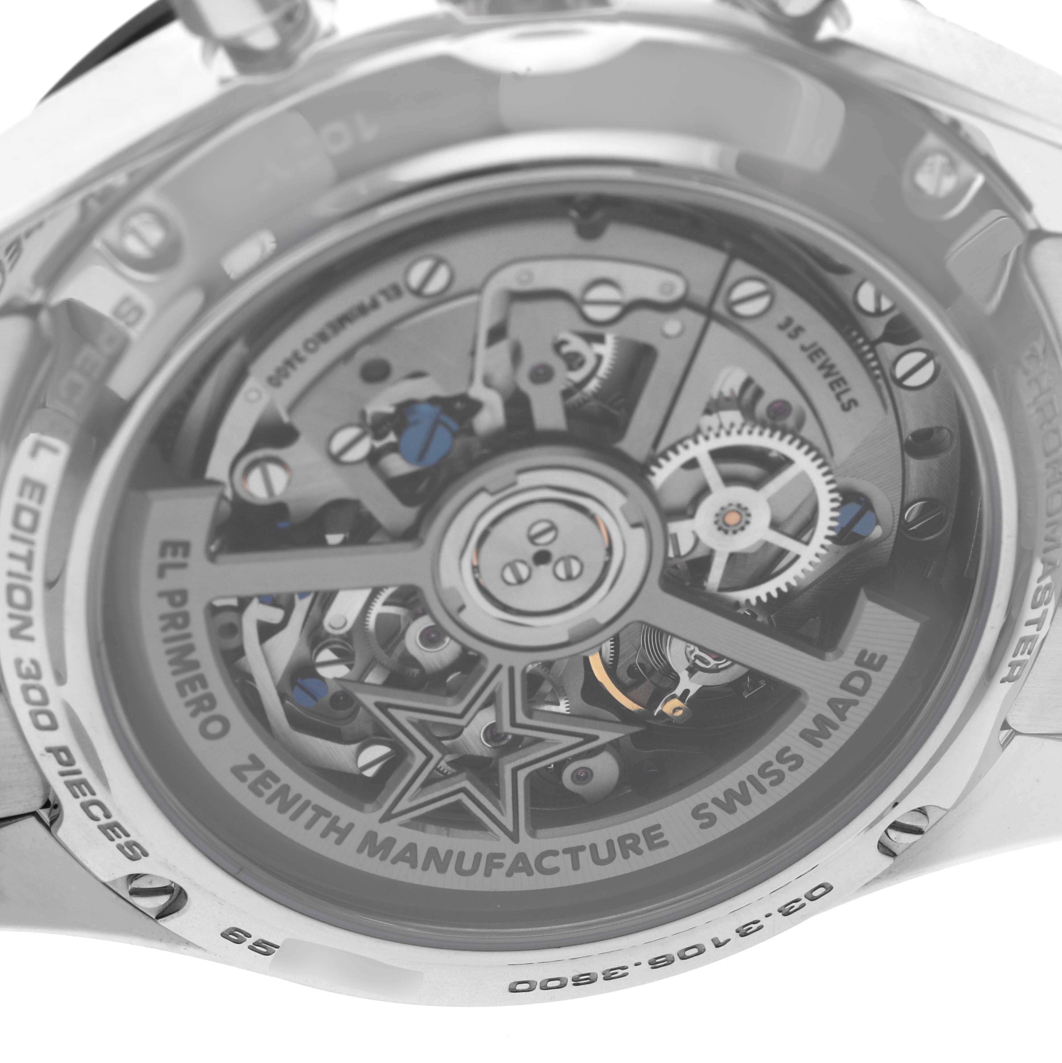 The image shows the back view of a Zenith Chronomaster 03.3106.3600/55.M3100 Men's Stainless Steel Blue Dial 03.3106.3600/55.M3100 Men's Stainless Steel Blue Dial watch, highlighting its intricate mechanical movement and parts.