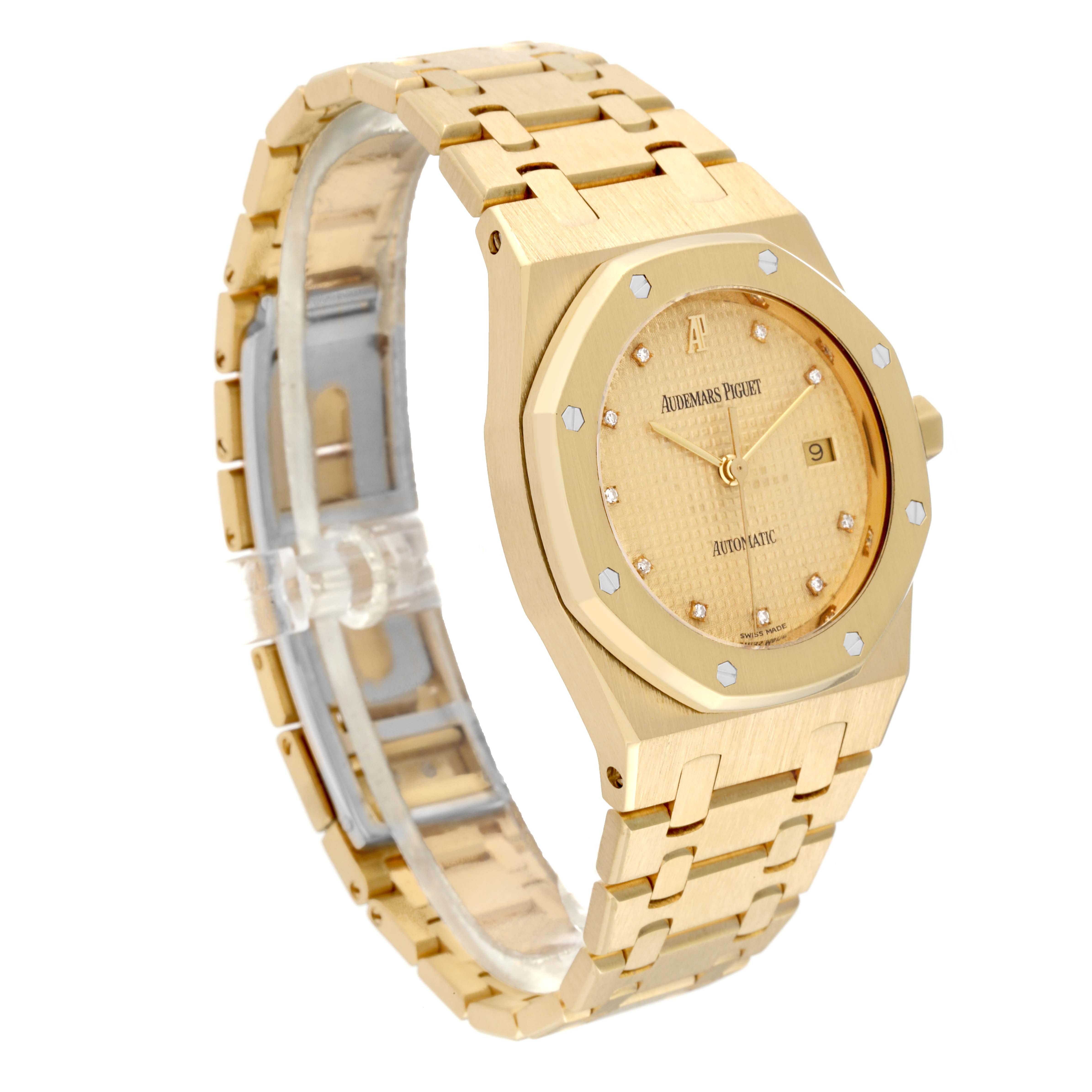 The image shows a side and front angled view of the Audemars Piguet Royal Oak 15000BA.OO.0789BA.04 Men's Yellow Gold Champagne Dial 15000BA.OO.0789BA.04 Men's Yellow Gold Champagne Dial watch, highlighting the face and bracelet.