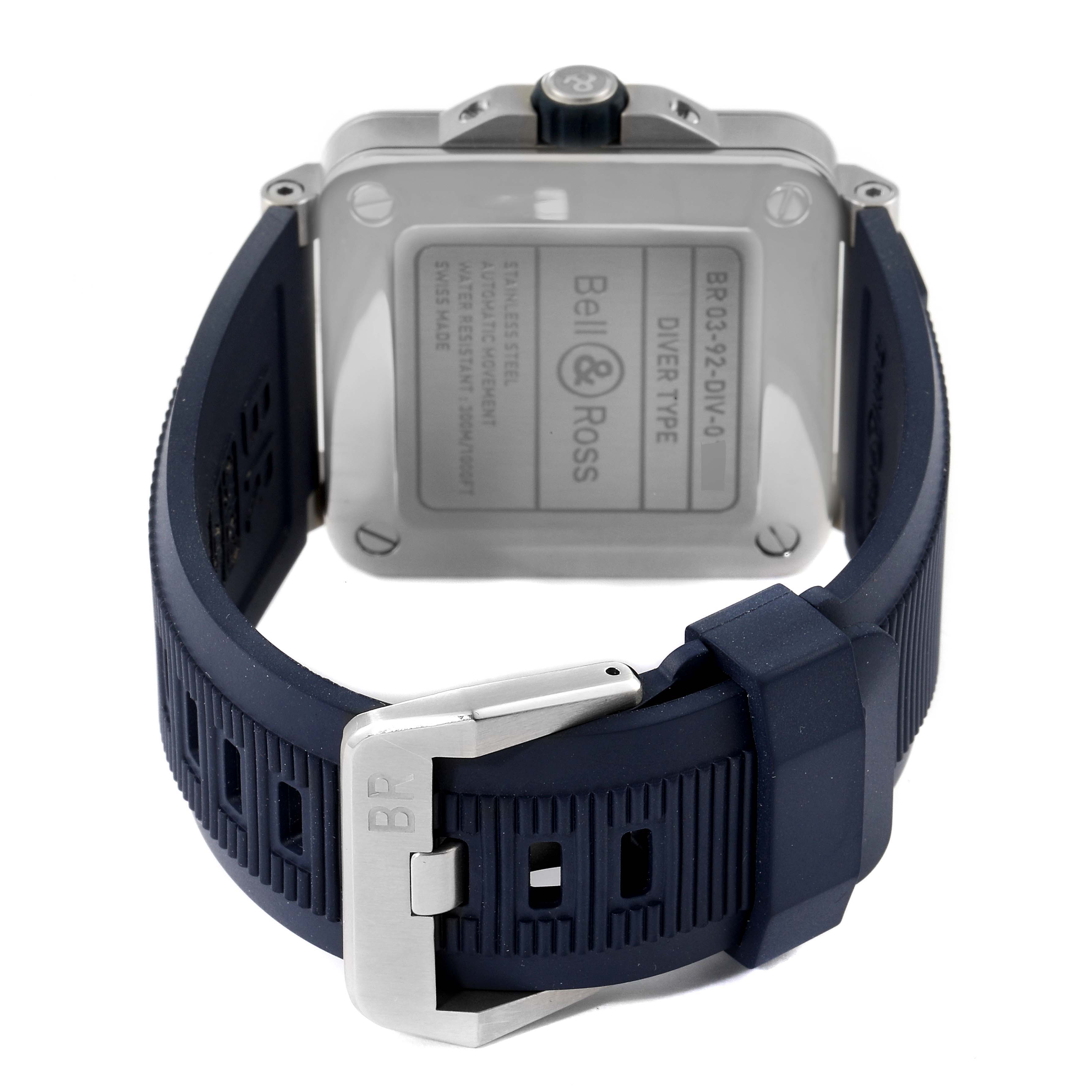 The image shows the back and strap of a Bell & Ross Diver model watch, highlighting the case back and clasp.