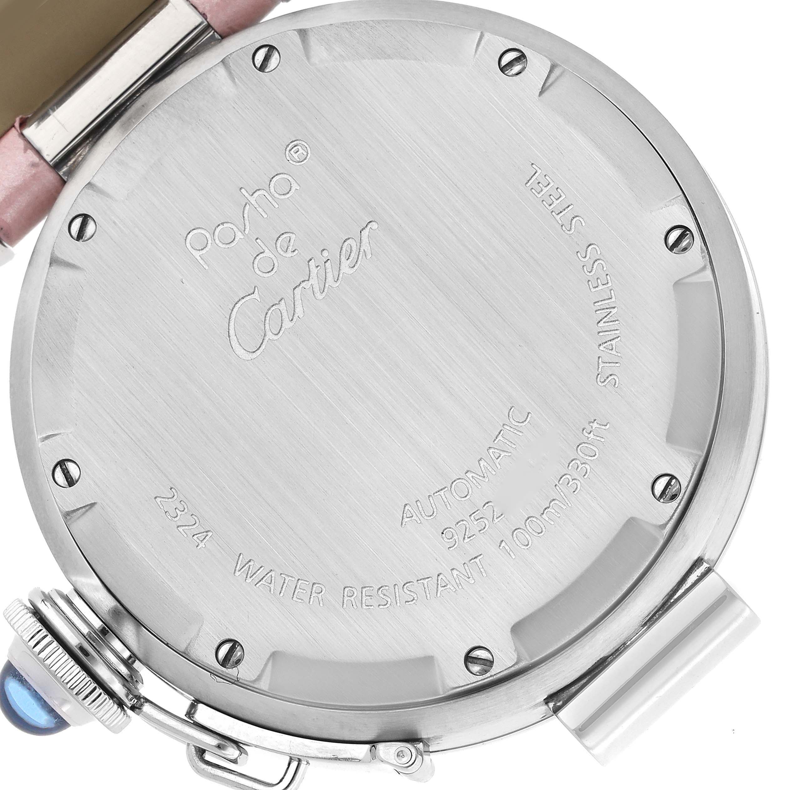 This image shows the back case of a Cartier Pasha 61675 Women's Stainless Steel Pink Dial 61675 Women's Stainless Steel Pink Dial model watch, highlighting the engraved details and crown.