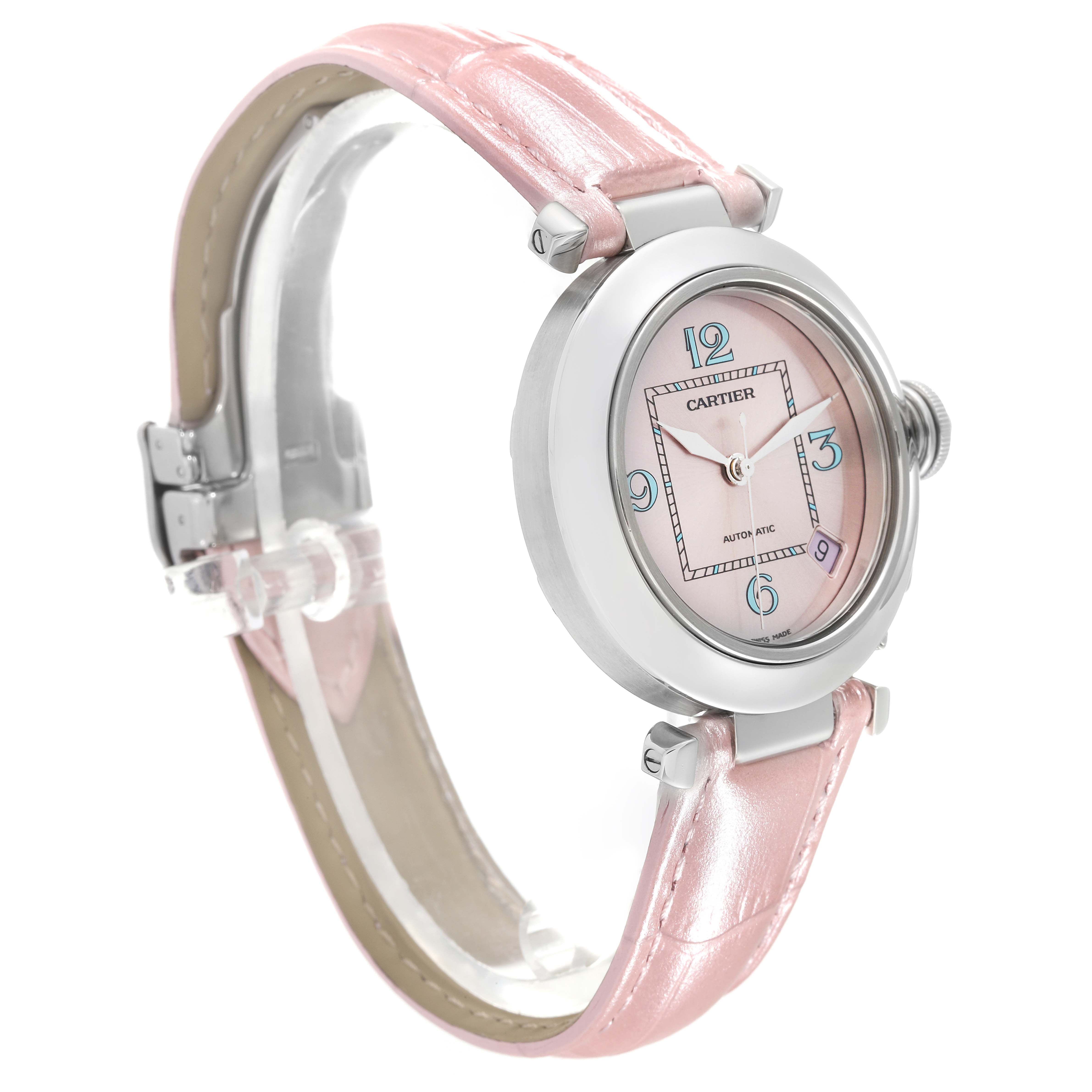 The Cartier Pasha 61675 Women's Stainless Steel Pink Dial 61675 Women's Stainless Steel Pink Dial watch is shown at an oblique angle, featuring a pink leather strap and silver case.