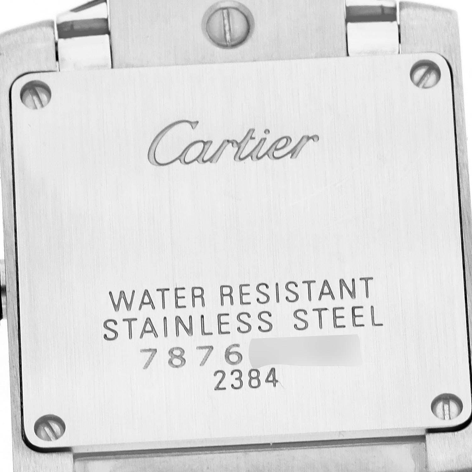 The image shows the back case of a Cartier Tank Francaise W51008Q3 Women's Stainless Steel Silver Dial W51008Q3 Women's Stainless Steel Silver Dial watch, highlighting its stainless steel material and water resistance.