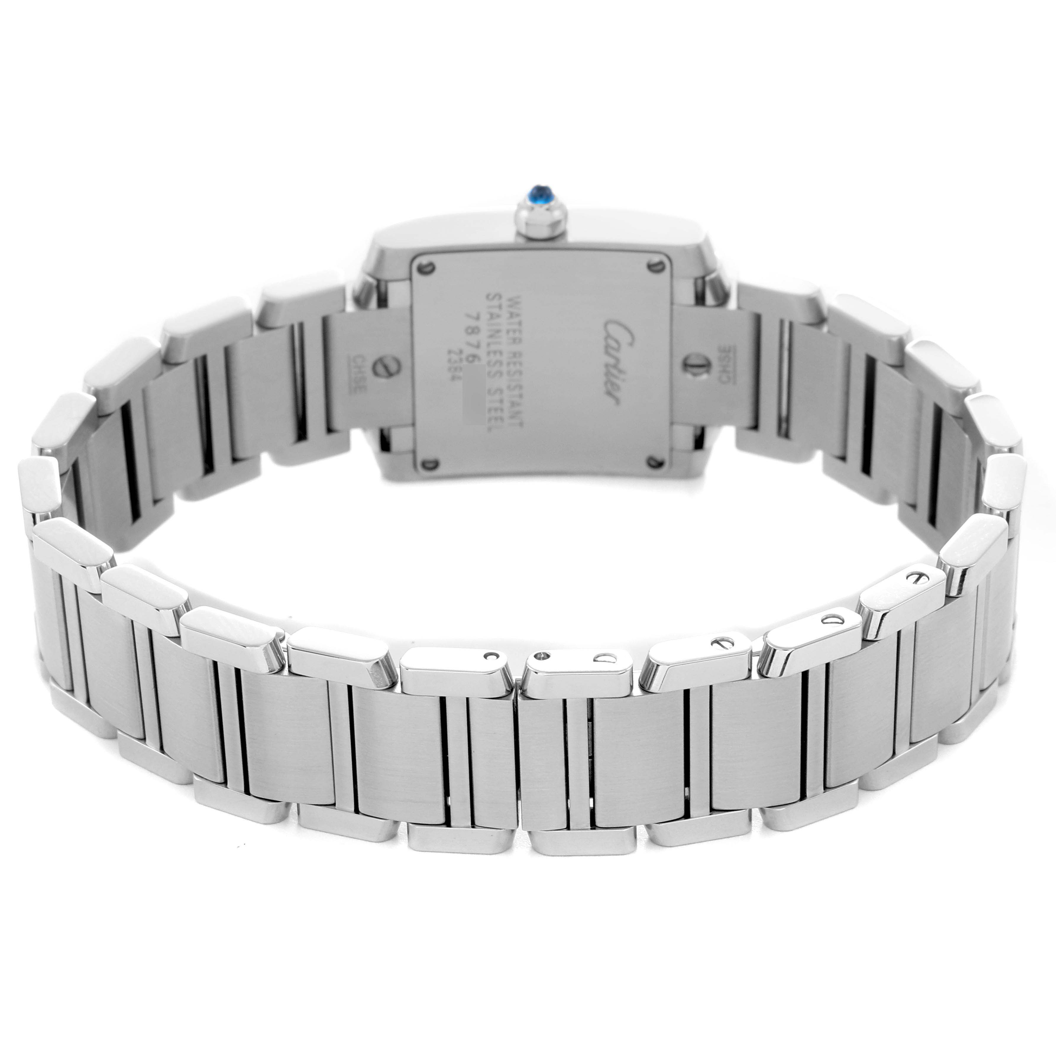 The image shows the back and bracelet of the Cartier Tank Française watch, highlighting its stainless steel construction.