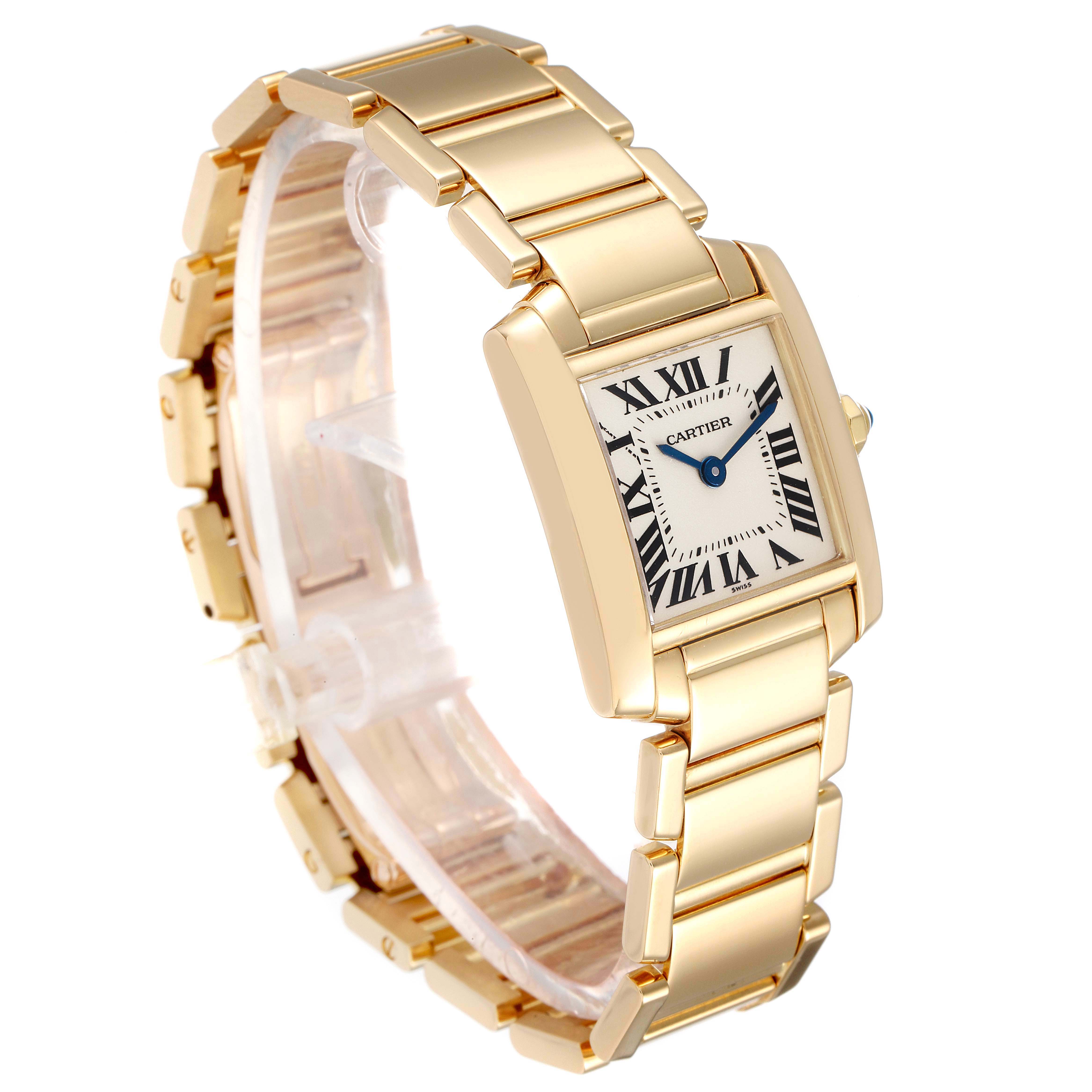 The Cartier Tank Francaise W50002N2 Women's Yellow Gold Silver Dial W50002N2 Women's Yellow Gold Silver Dial watch is shown at an angle revealing the face, bezel, and part of the bracelet.