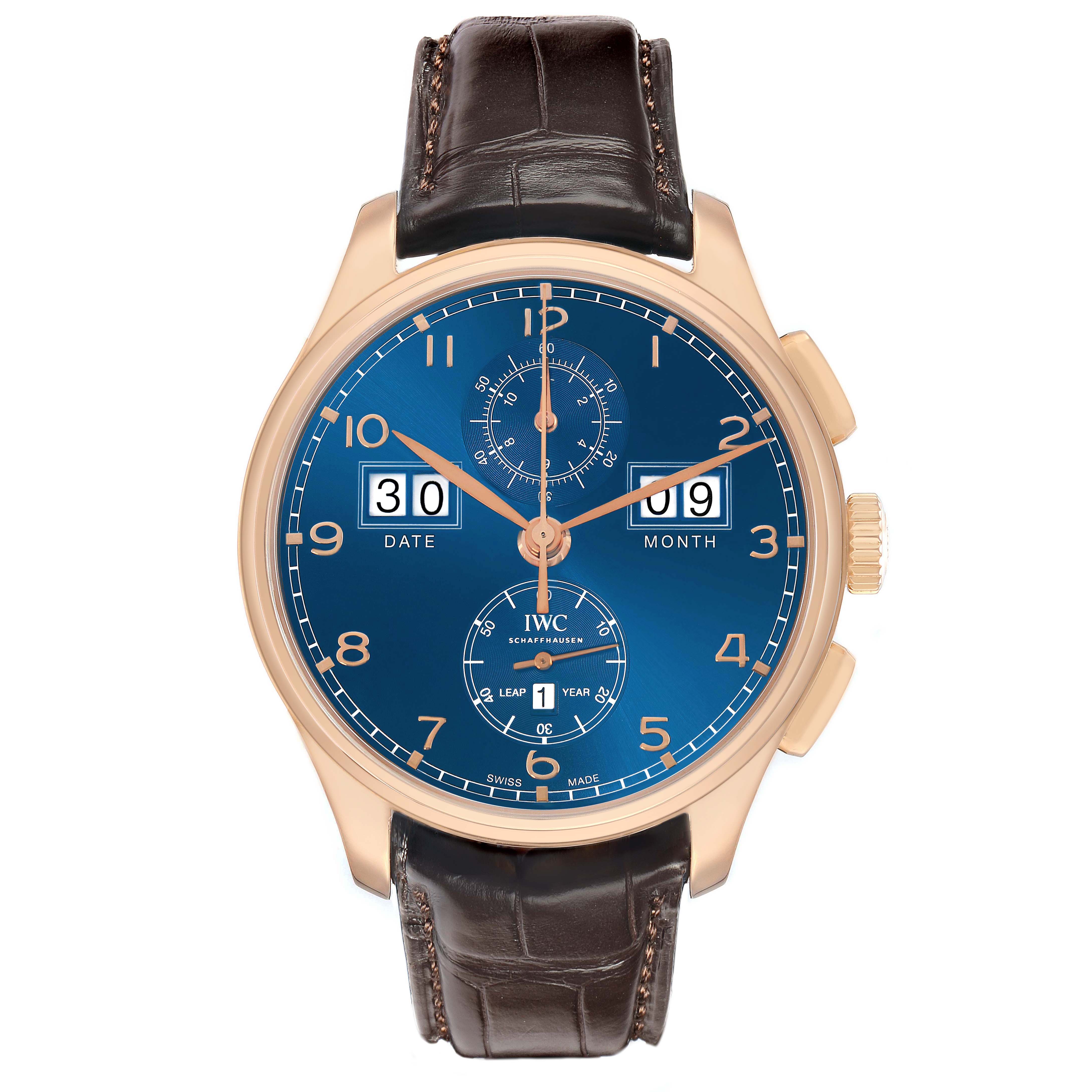 The IWC Portuguese IW397204 Men's Rose Gold Blue Dial watch is shown from the front, displaying its face, dial, date, month, leap year indicators, and a leather strap.