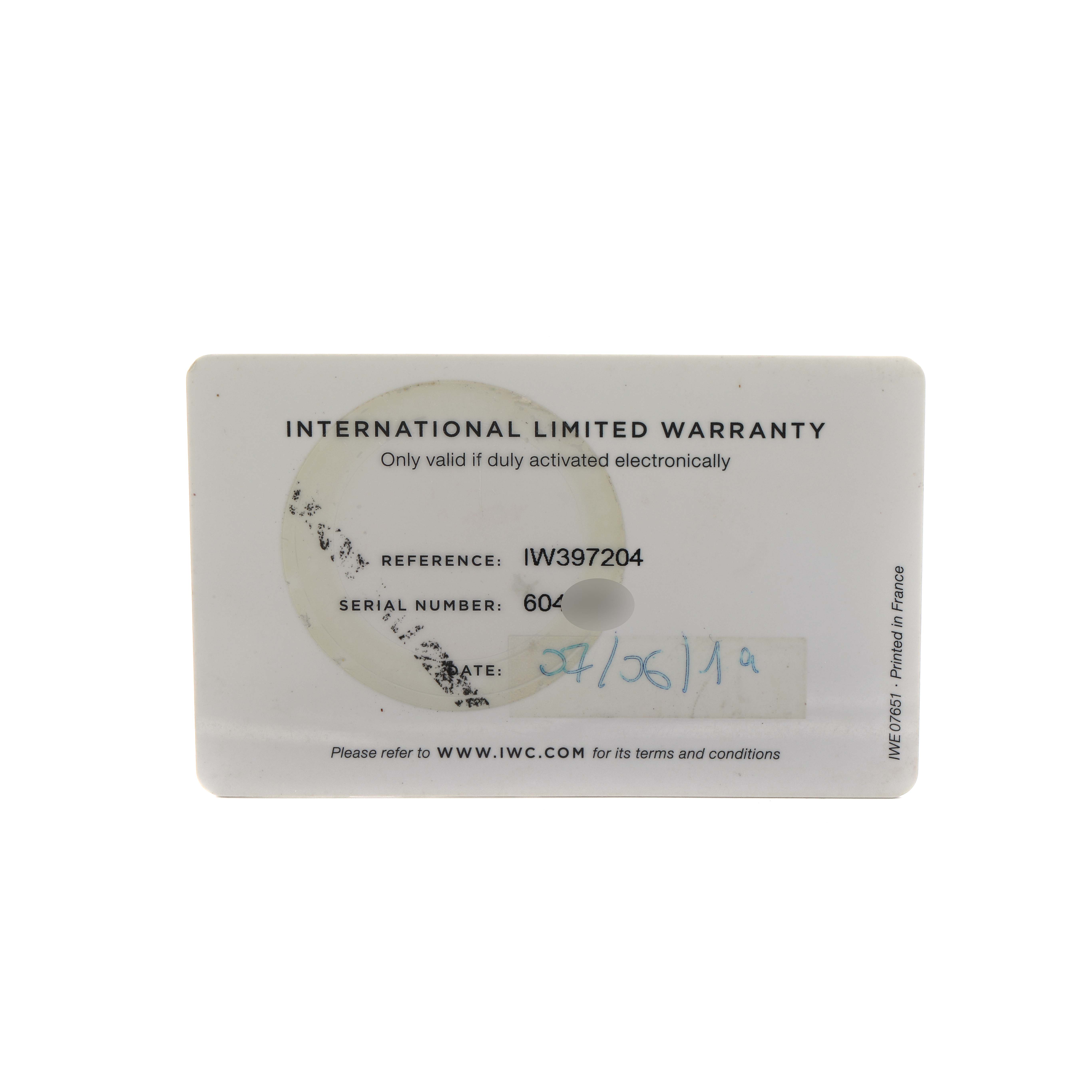 The image shows an IWC Portuguese IW397204 Men's Rose Gold Blue Dial model warranty card with reference and serial numbers.