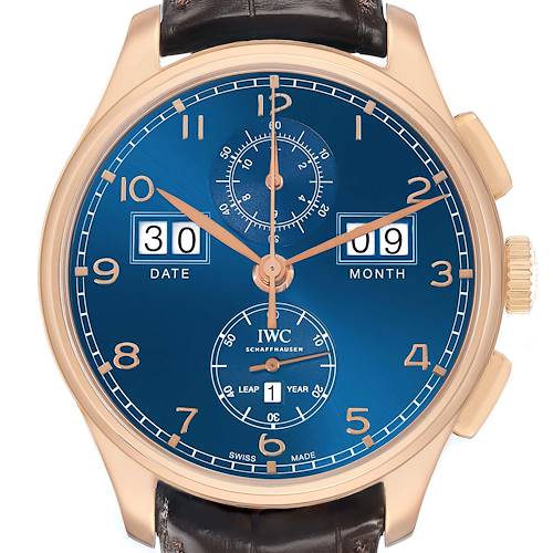 The IWC Portuguese IW397204 Men's Rose Gold Blue Dial watch is shown from a front angle displaying its blue dial, date, month, and chronograph features.