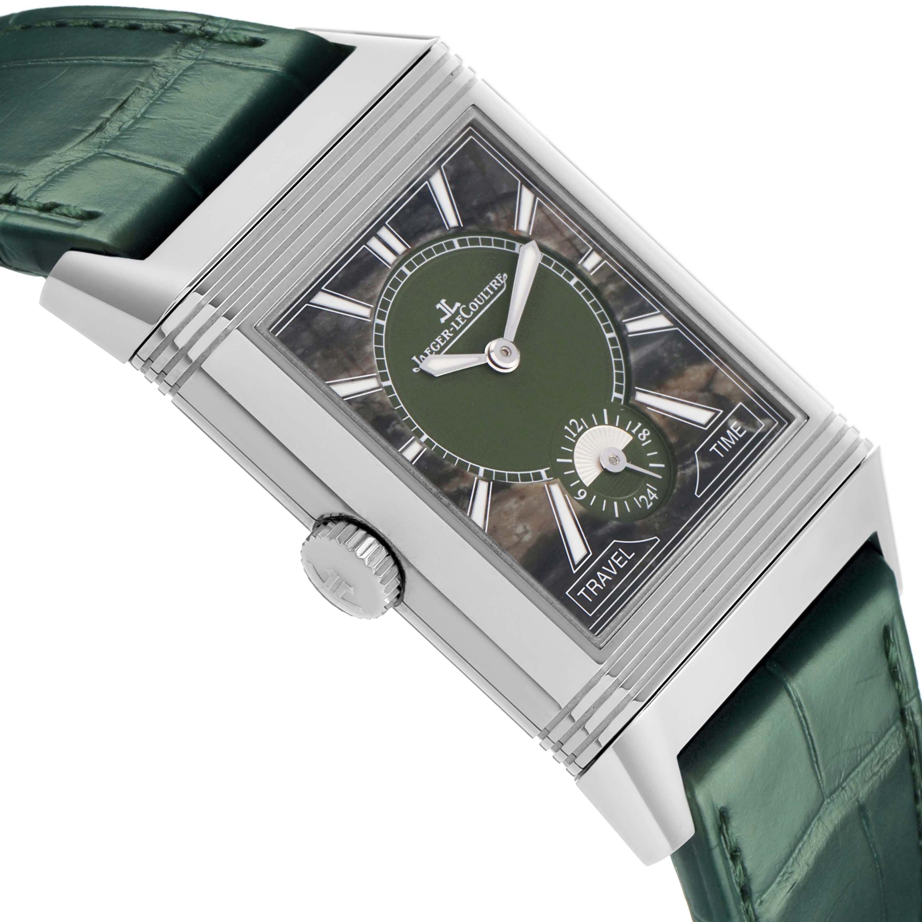 The Jaeger-LeCoultre Reverso watch is shown at an angle displaying the face, crown, and green strap.
