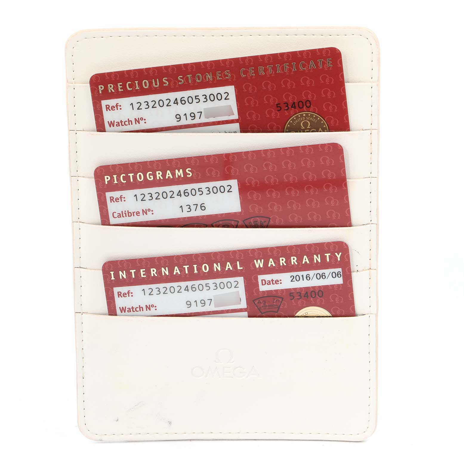 The image shows three red cards in slots, including Precious Stones Certificate, Pictograms, and International Warranty, for the Omega 123.20.24.60.53.002 Women
s Stainless Steel Blue Dial 123.20.24.60.53.002 Women
s Stainless Steel Blue Dial Constellation Steel Blue Diamond Dial Watch model 123.20.24.60.53.002.