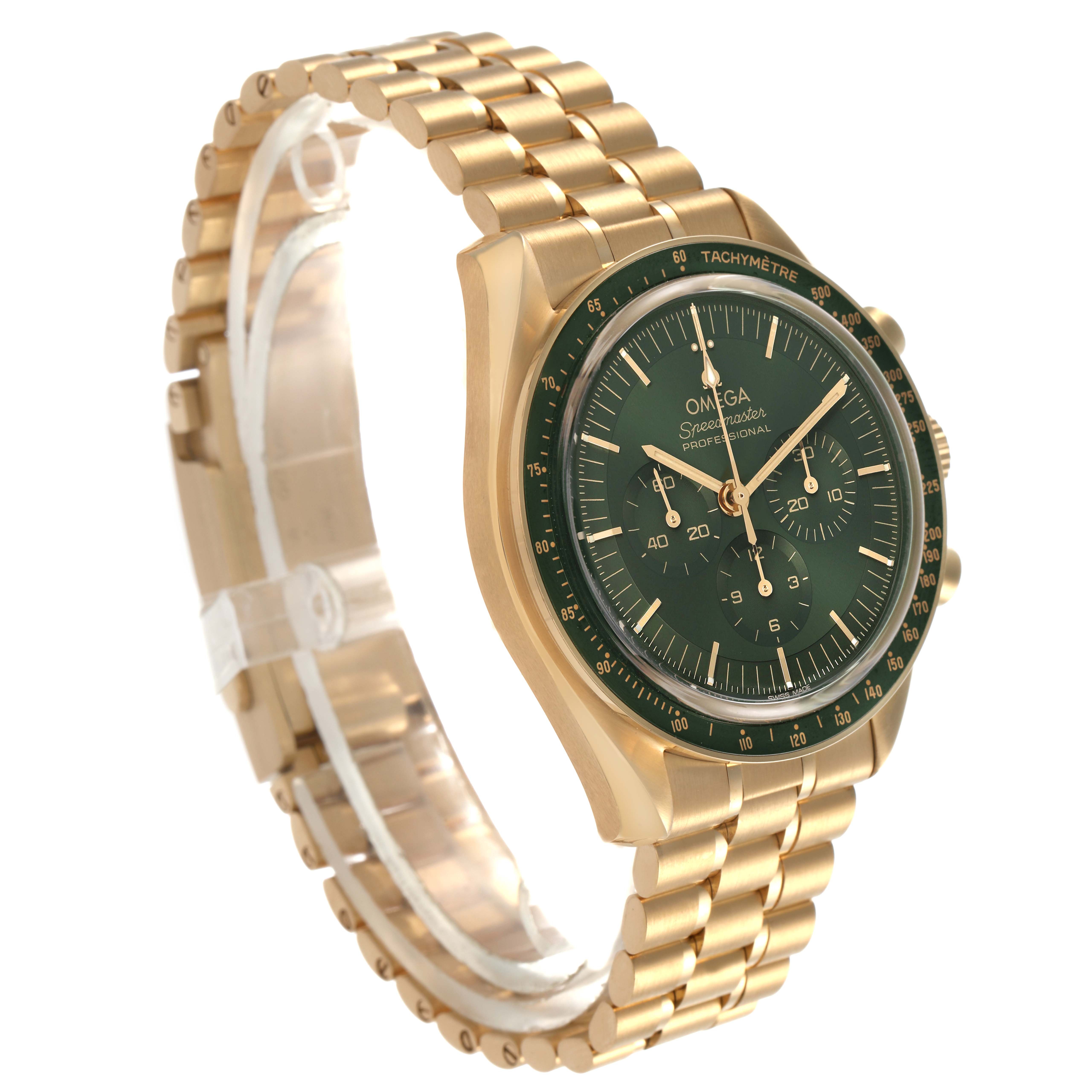The Omega Speedmaster 310.60.42.50.10.001 Men's Yellow Gold Green Dial watch is shown at a three-quarter angle, displaying the face, bezel, and bracelet.