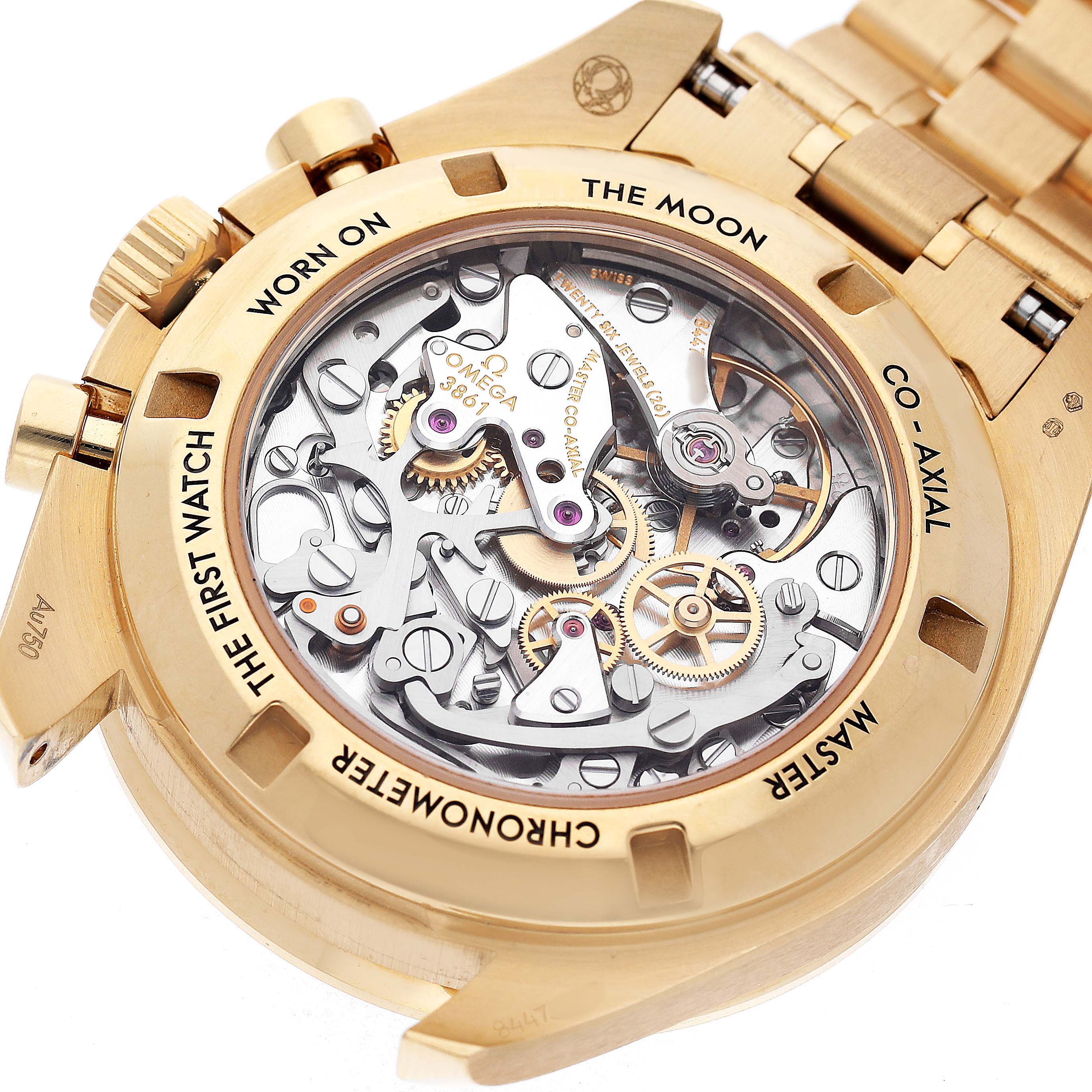 The image shows the transparent case back of an Omega Speedmaster 310.60.42.50.10.001 Men's Yellow Gold Green Dial, revealing its intricate movement details.