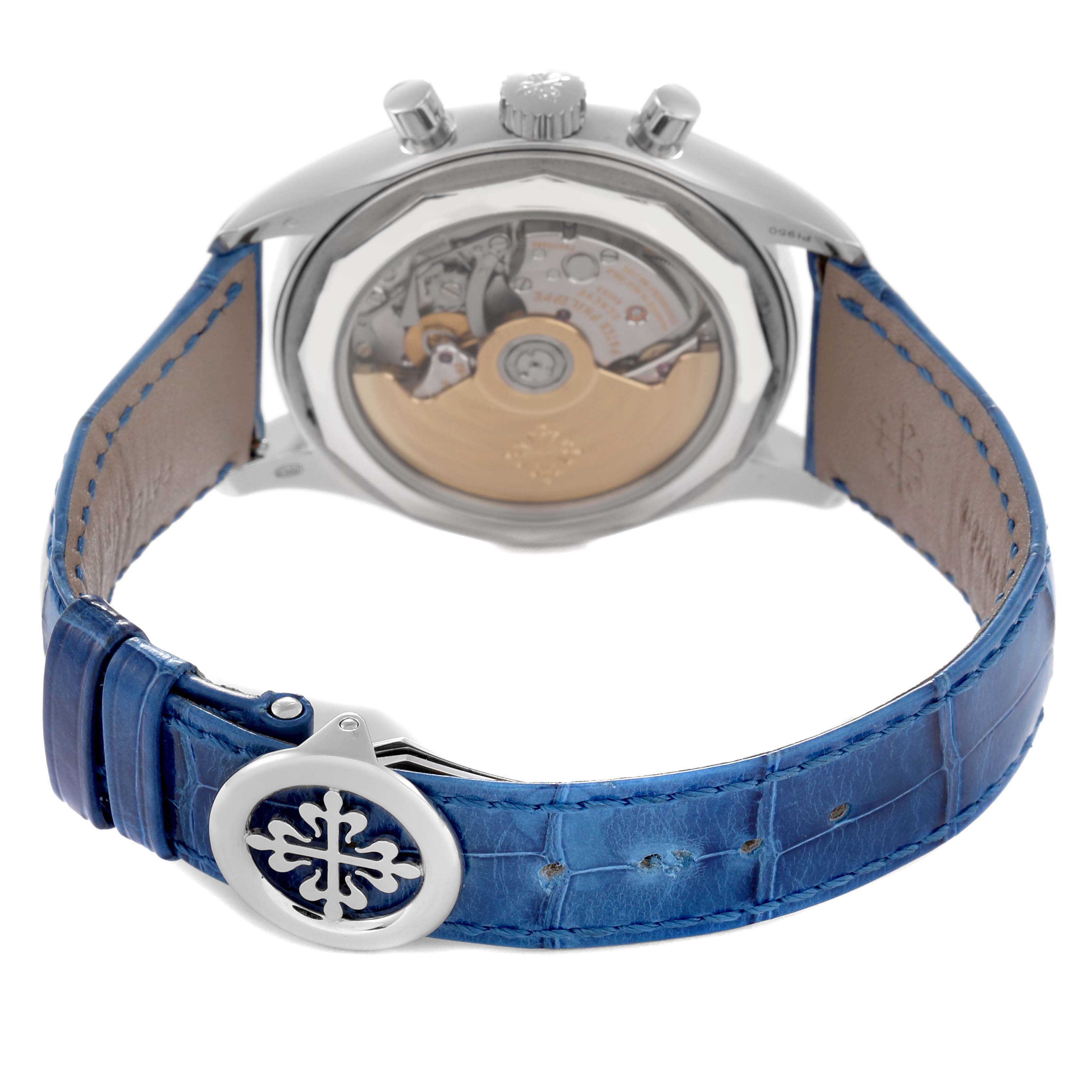 The Patek Philippe Complications 5960P-015 Men
s Platinum Blue Dial watch is shown from the back, highlighting the movement and a blue leather strap with a branded clasp.