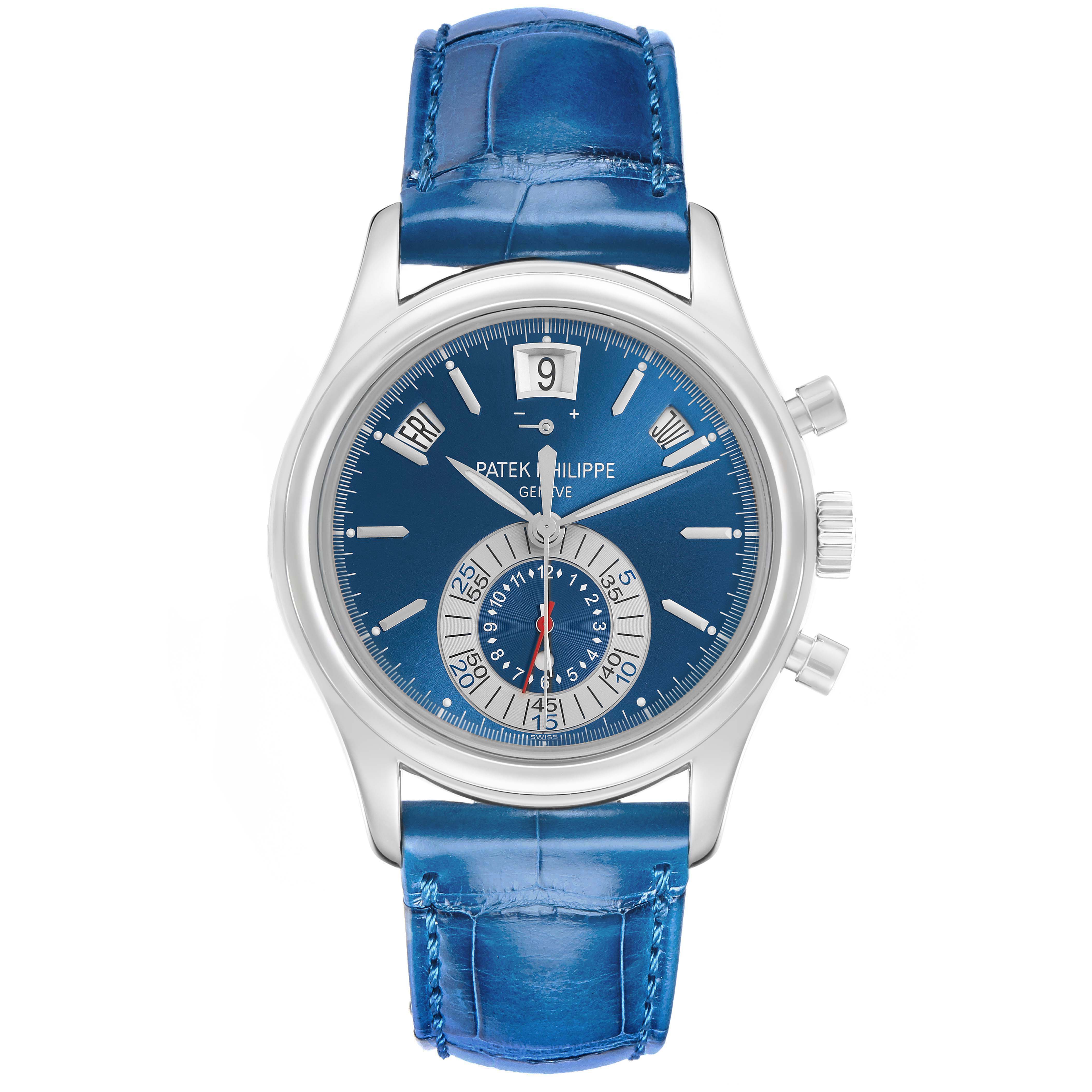 The Patek Philippe Complications 5960P-015 Men
s Platinum Blue Dial watch is shown from a top-down angle, displaying its blue dial, calendar functions, and blue strap.