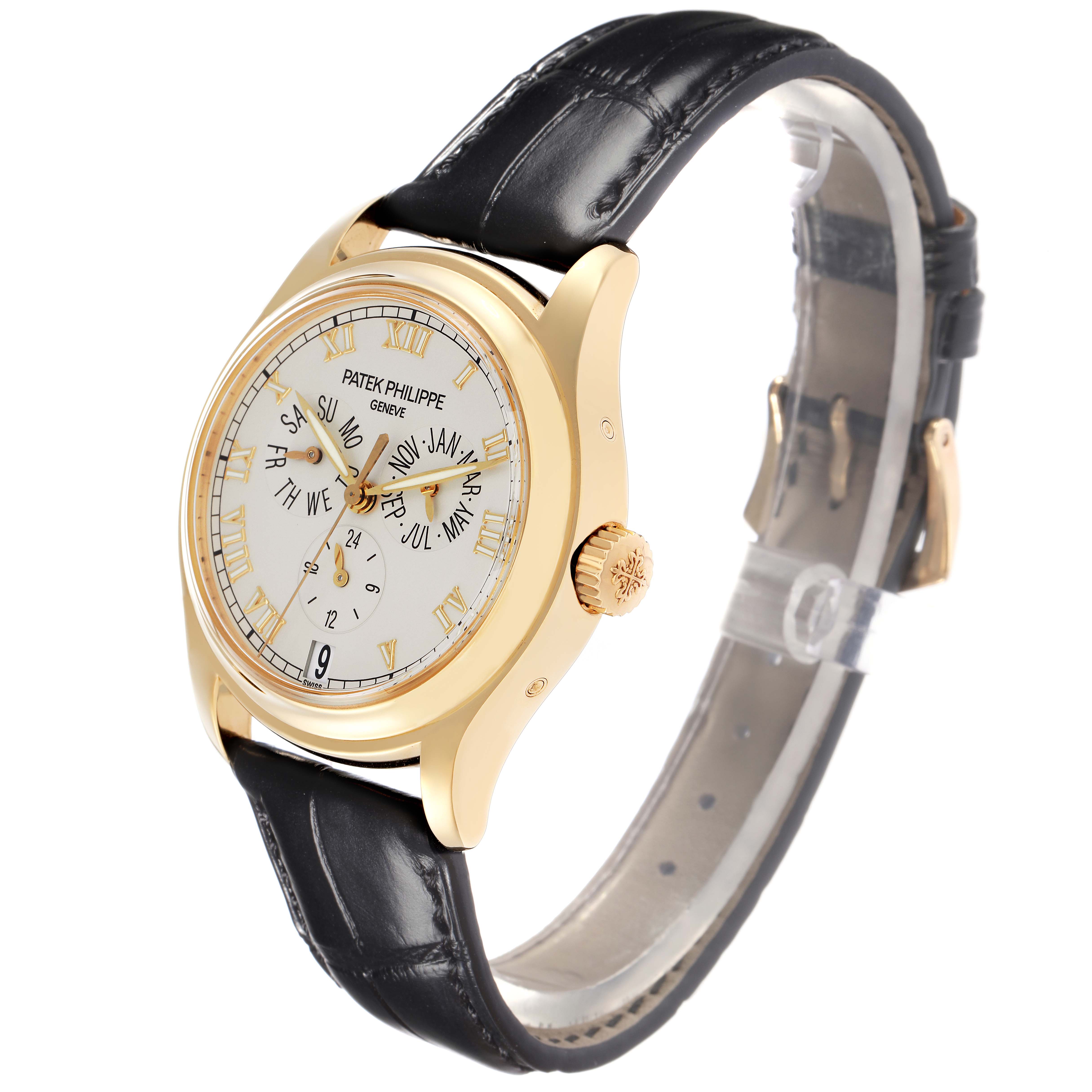 The image shows a Patek Philippe Complications 5035J-001 Men's Yellow Gold White Dial 5035J-001 Men's Yellow Gold White Dial watch from a three-quarter angle, highlighting the face, bezel, crown, and strap.