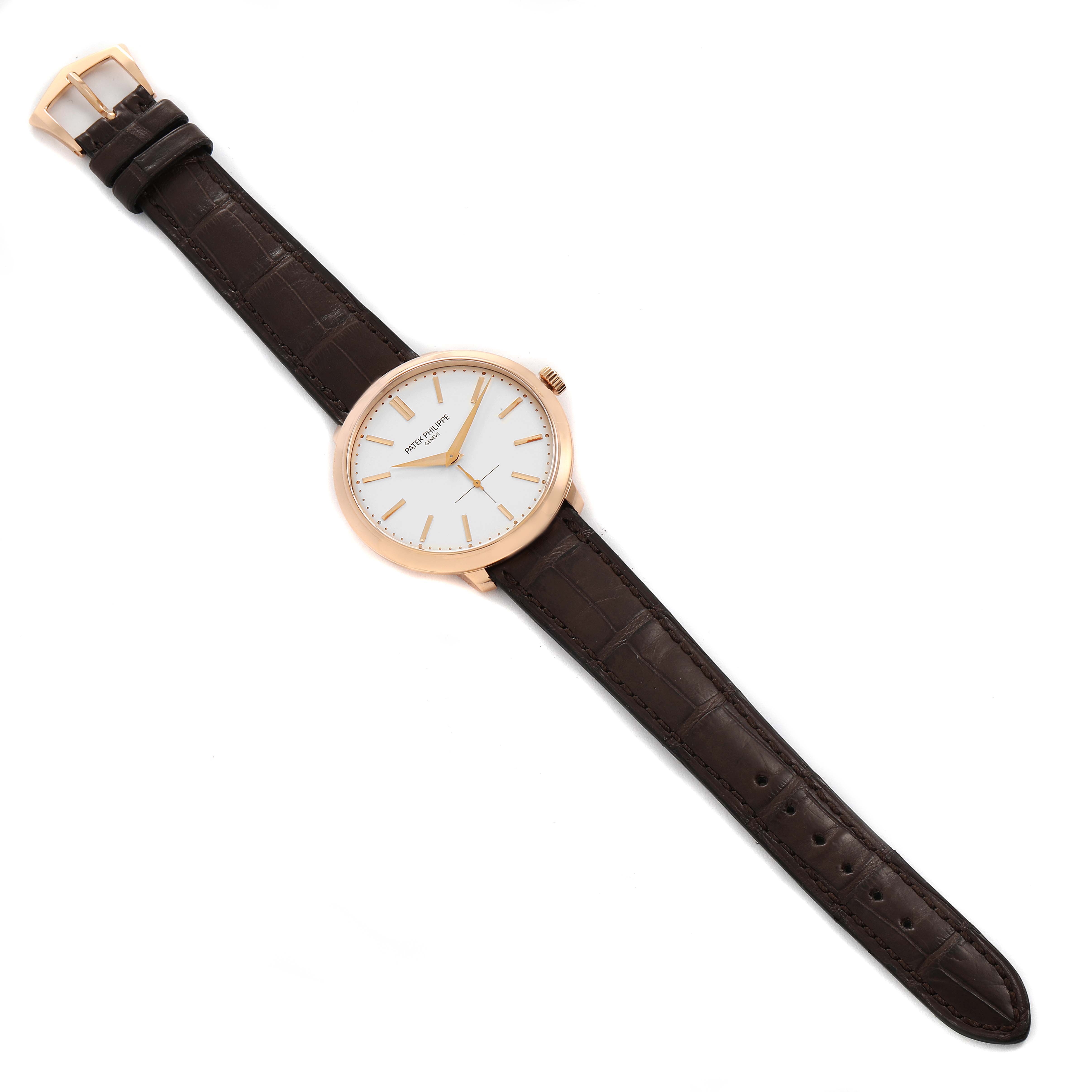 The image shows the Patek Philippe Calatrava 5123R-001 Men's Rose Gold Silver Dial 5123R-001 Men's Rose Gold Silver Dial watch, featuring a brown leather strap and gold case from a top-down angle.